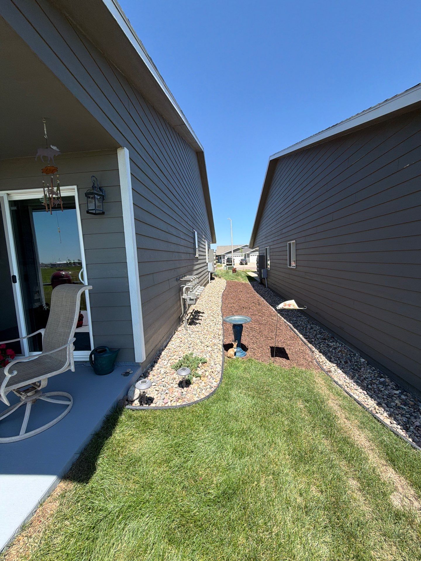Starry Evening Concrete Patio Coating Installation in Tea by Select Painting, Coatings & Garage Cabinets