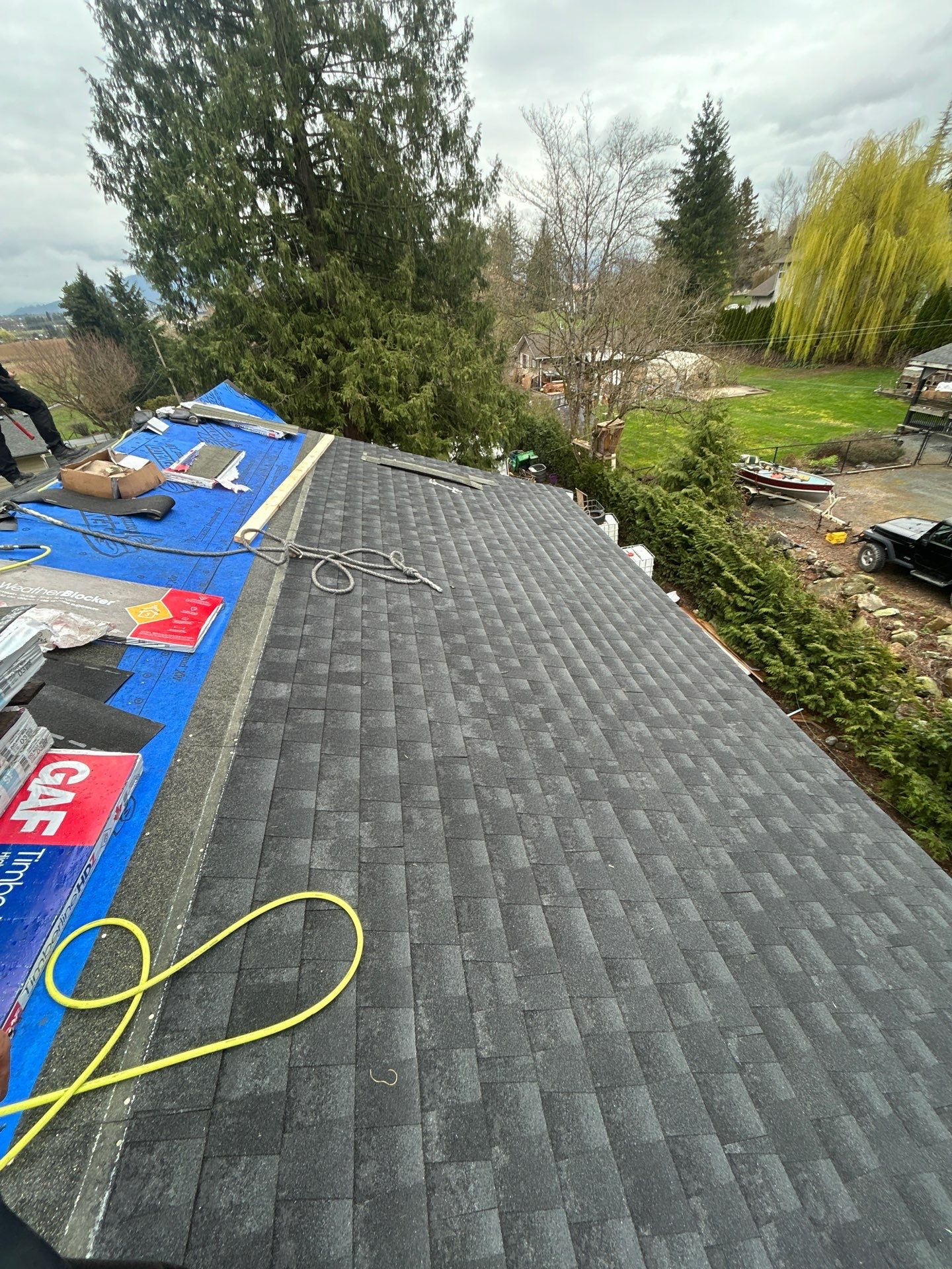 Residential Roofing Installation using GAF Charcoal HDZ by Top Notch Roofing Inc