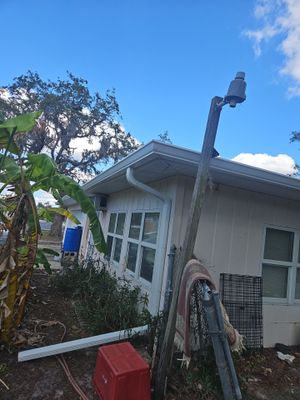 Downspout Installation using White Down Spouts in Sarasota FL