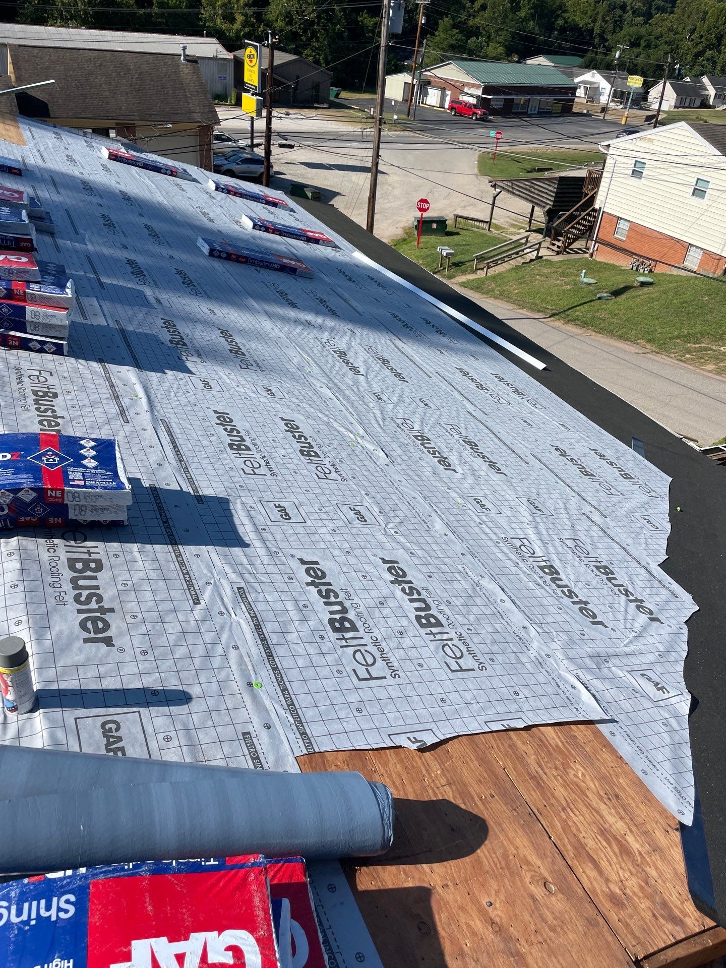 Residential Roofing Installation using GAF TImberline HDZ Hickory by Rainstoppers Roofing