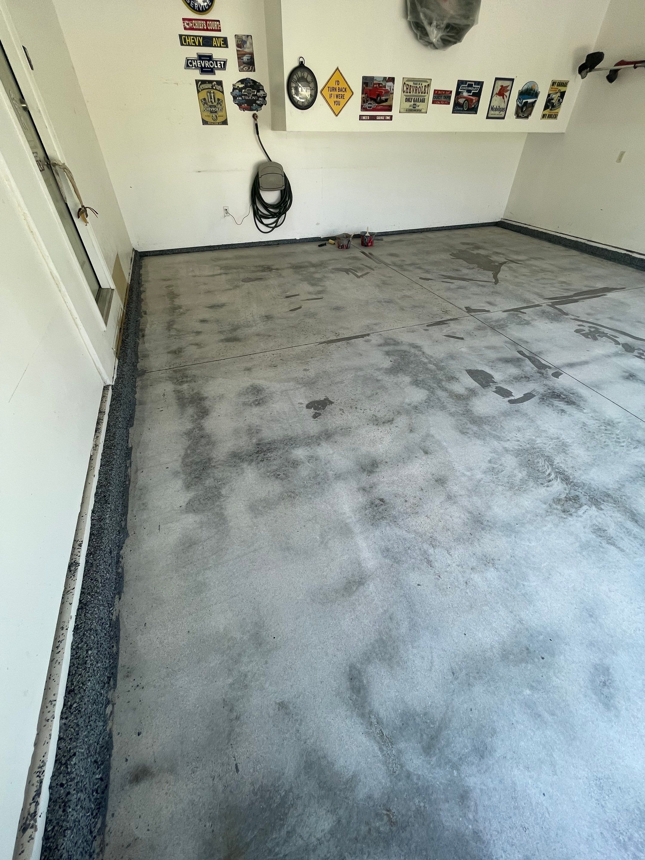 Sioux Falls Garage Floor Coating with Nightfall Decorative Chips by Select Painting, Coatings & Garage Cabinets