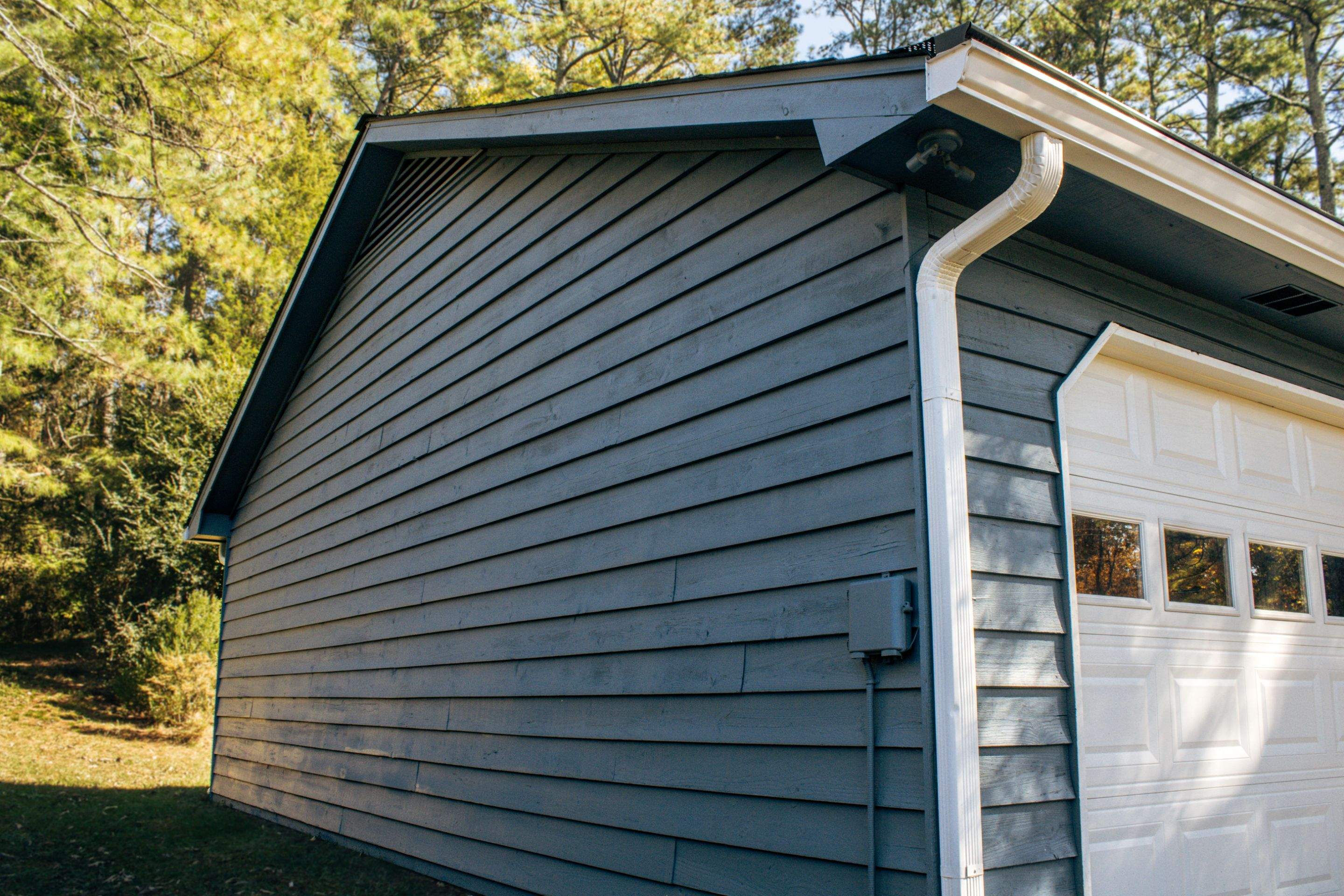 Marietta, GA Exterior Painting Transformation with Blue Paint by Nelson Exteriors