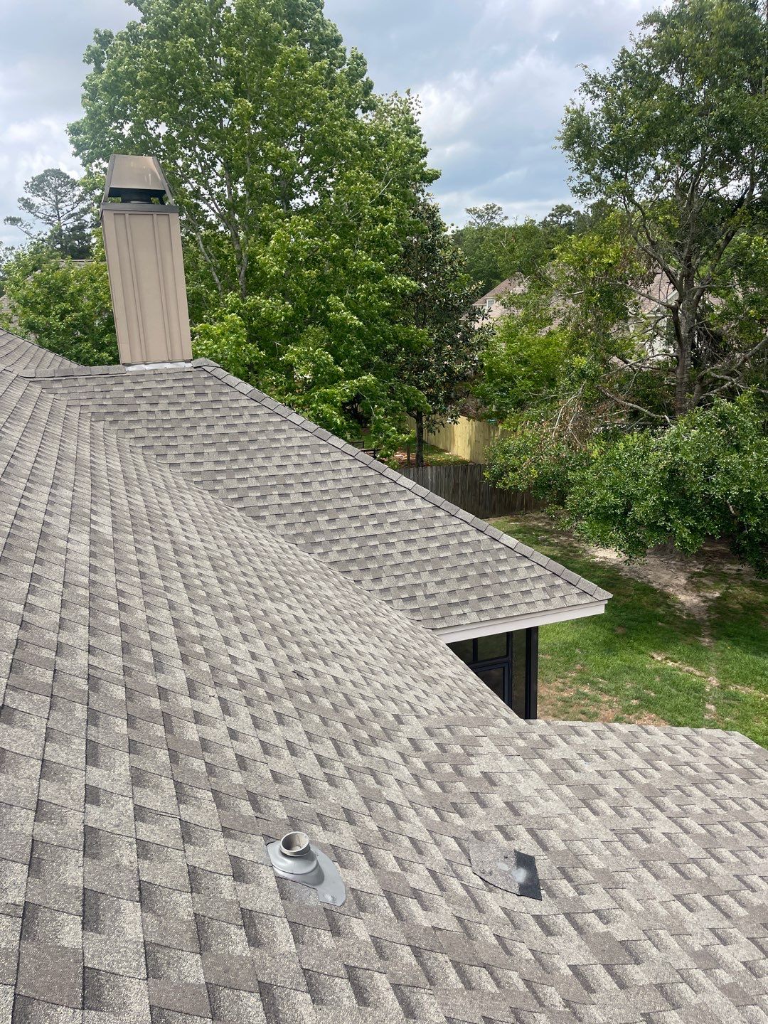 Residential Roofing Installation using Roof Replacement by American Roofing & Construction LLC
