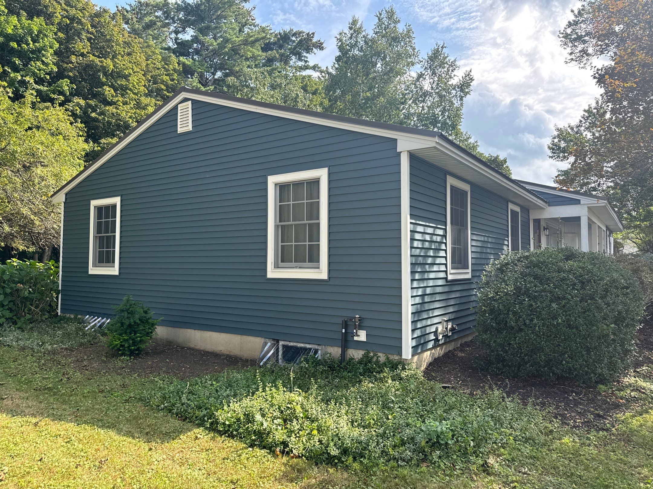 Vinyl Siding Replacement & Extensive Rot Repair in North Hampton, NH by Compass exteriors