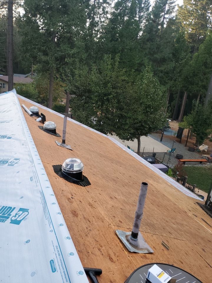 Residential Roofing Installation using Owens Corning Insulation by Byers Enterprises 