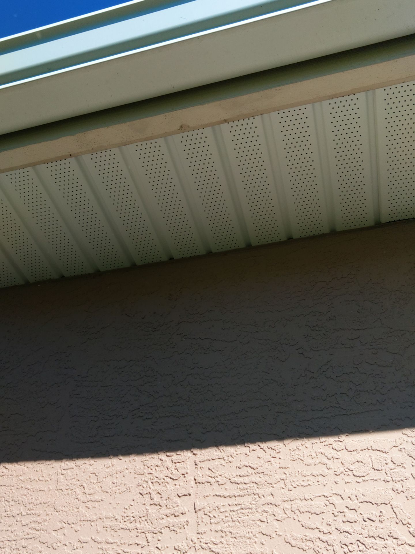 White Soffit and Fascia Installation for Coastal Homes in Sarasota FL by Gutter Professors