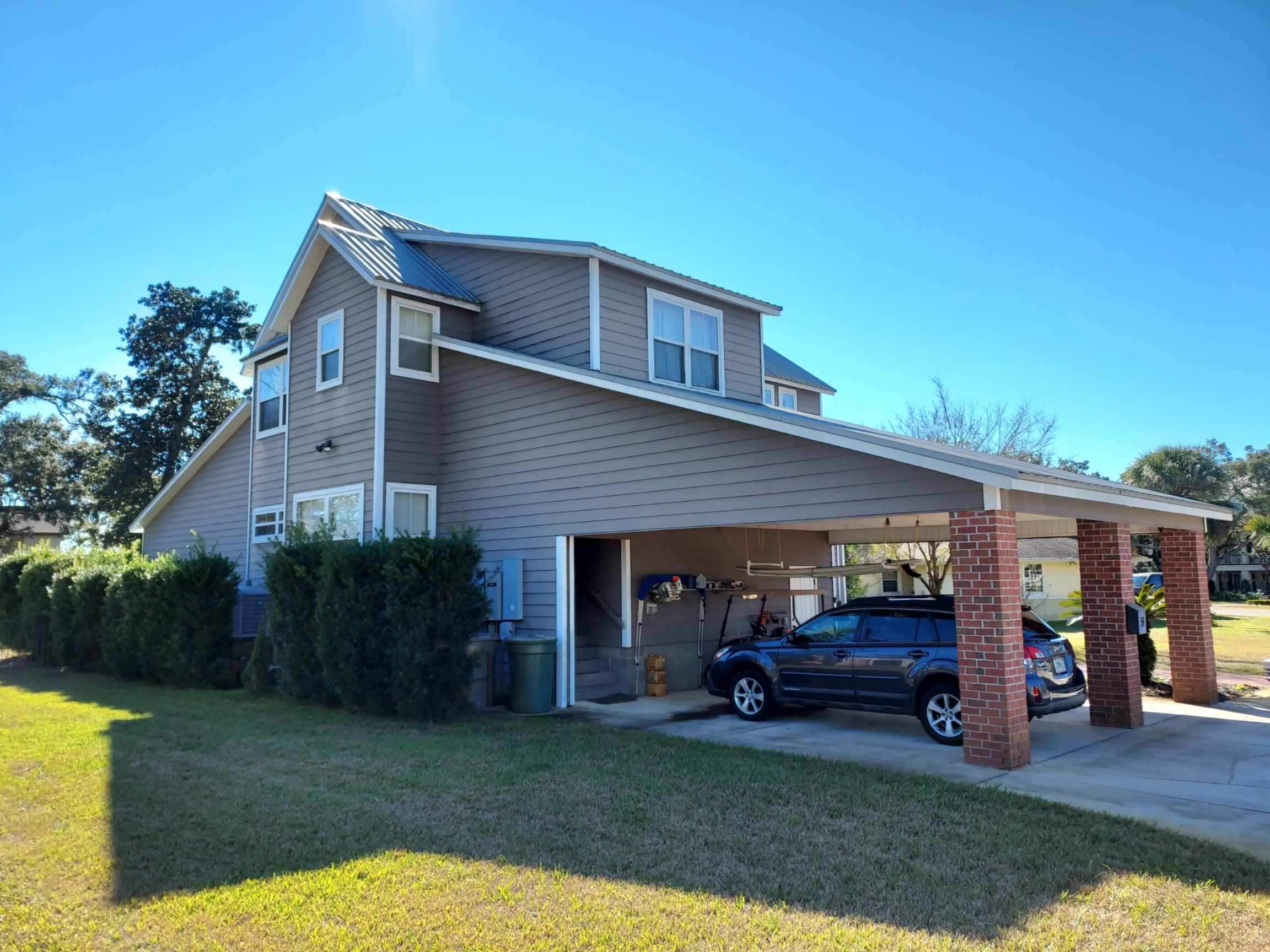 Downspout Extensions for Pensacola Homes by Gutter Professors