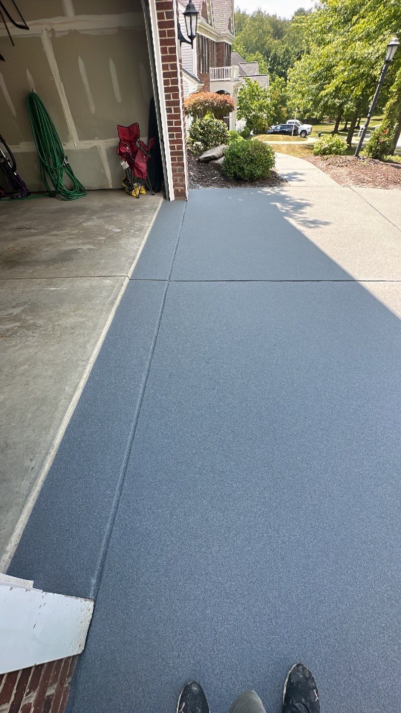 Pool Deck + Driveway + Garage Project in Venetia by Floors in a Day, Inc