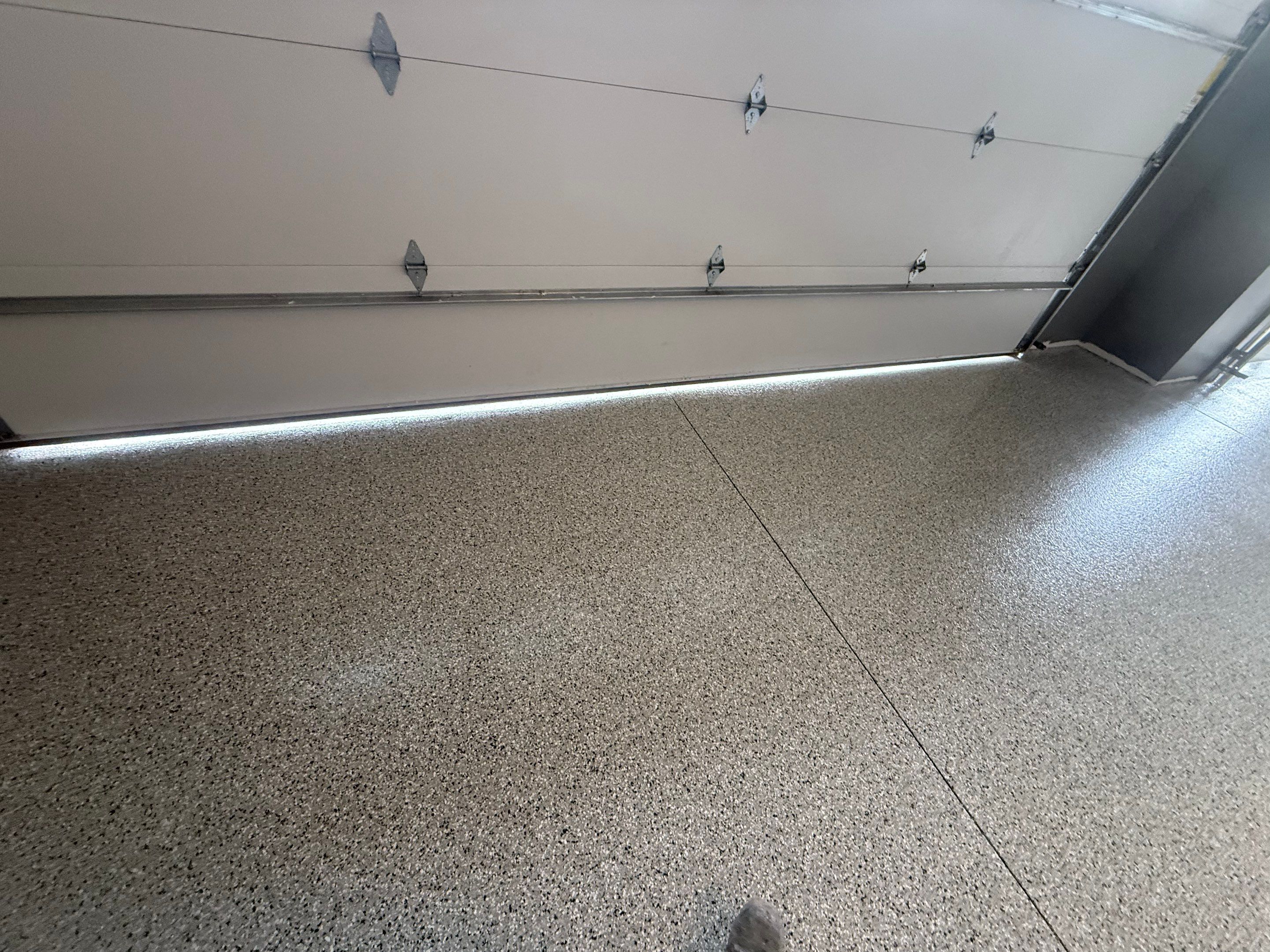 Custom Speckled Concrete Coating for Dell Rapids Garage by Select Painting, Coatings & Garage Cabinets