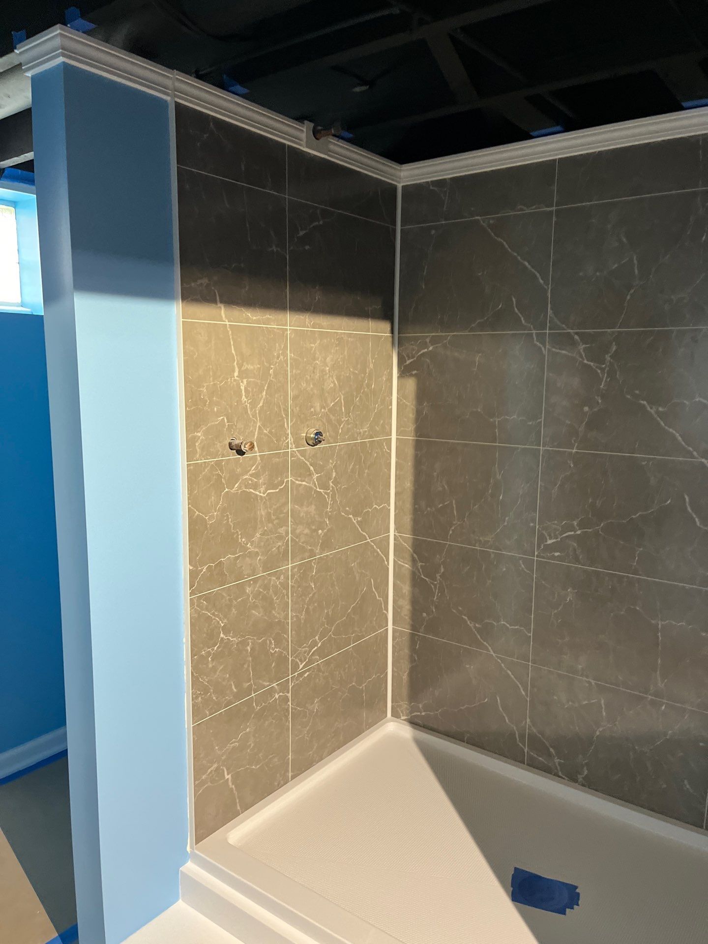 Basement Bathroom Remodel by Ivy Lea Construction