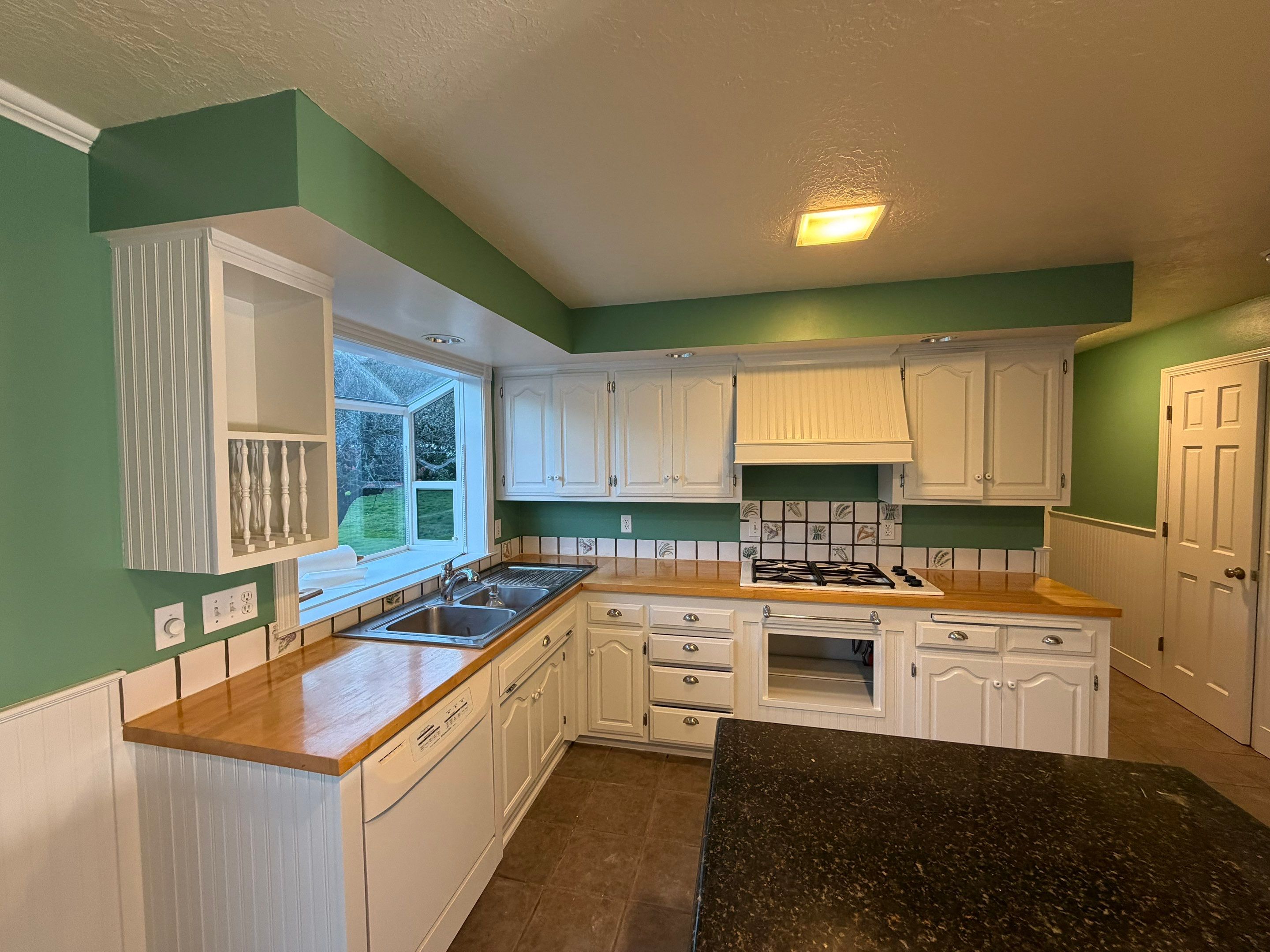 Kitchen Cabinets Painting by Handyman State LLC