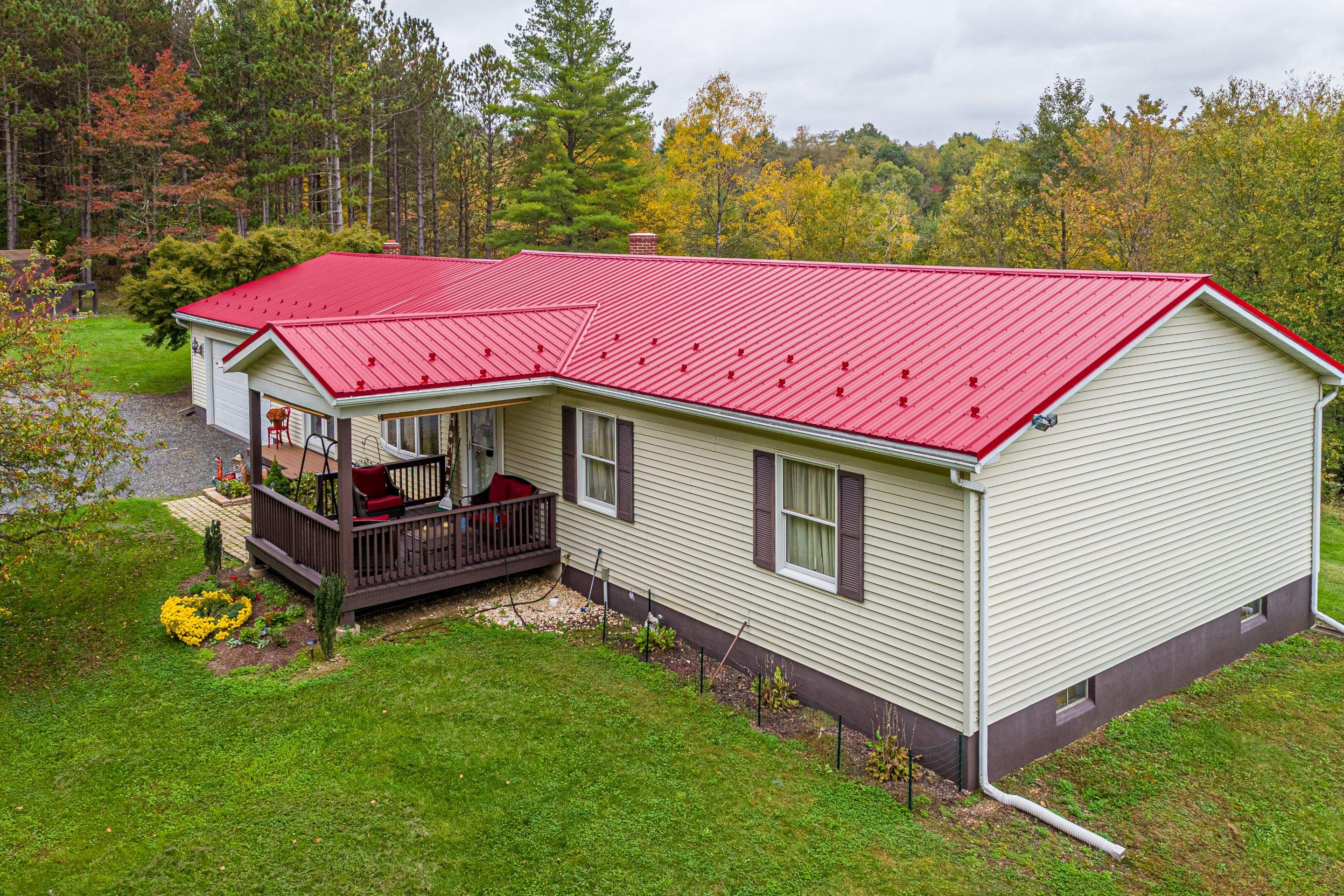 Metal Roof-scarlet red by Esh Builders