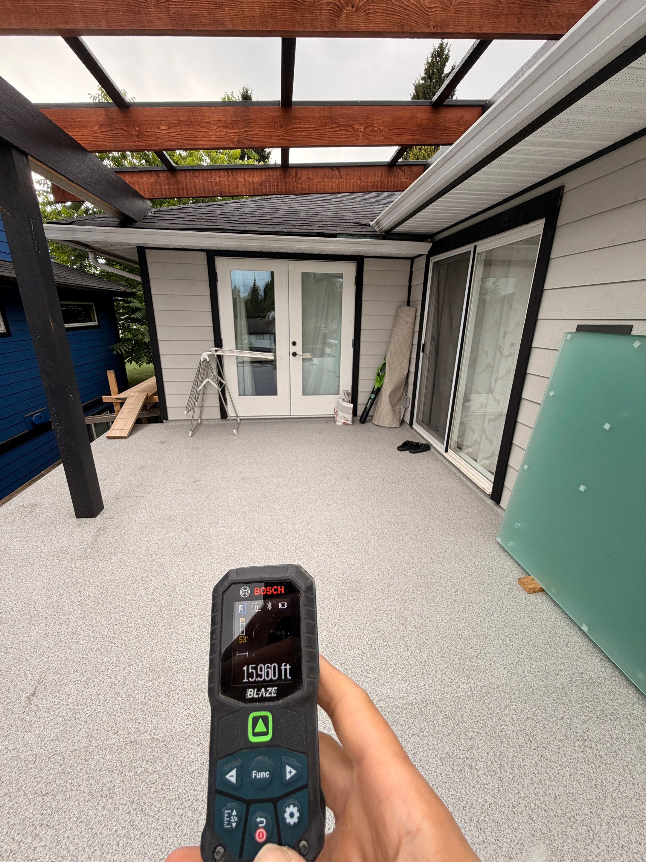 New Composite Deck with glass railing in North Vancouver by YVR Construction Group