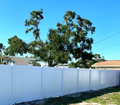 Vinyl Fence Installation using Vinyl Privacy Fence 