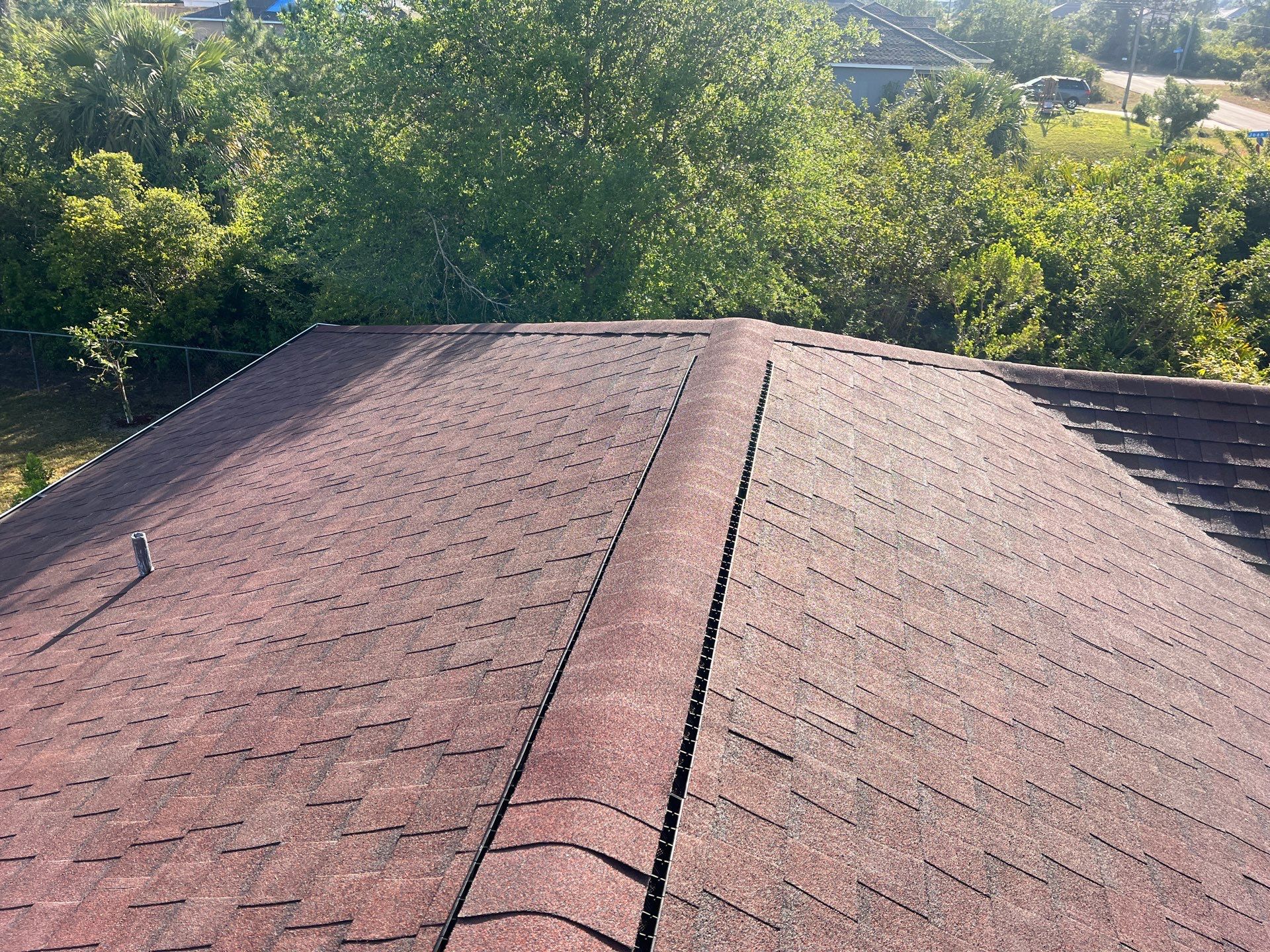 Residential Roofing Installation using Atlas Pinnacle Pristine Shingle in Sunset by Durabilis Roofing INC