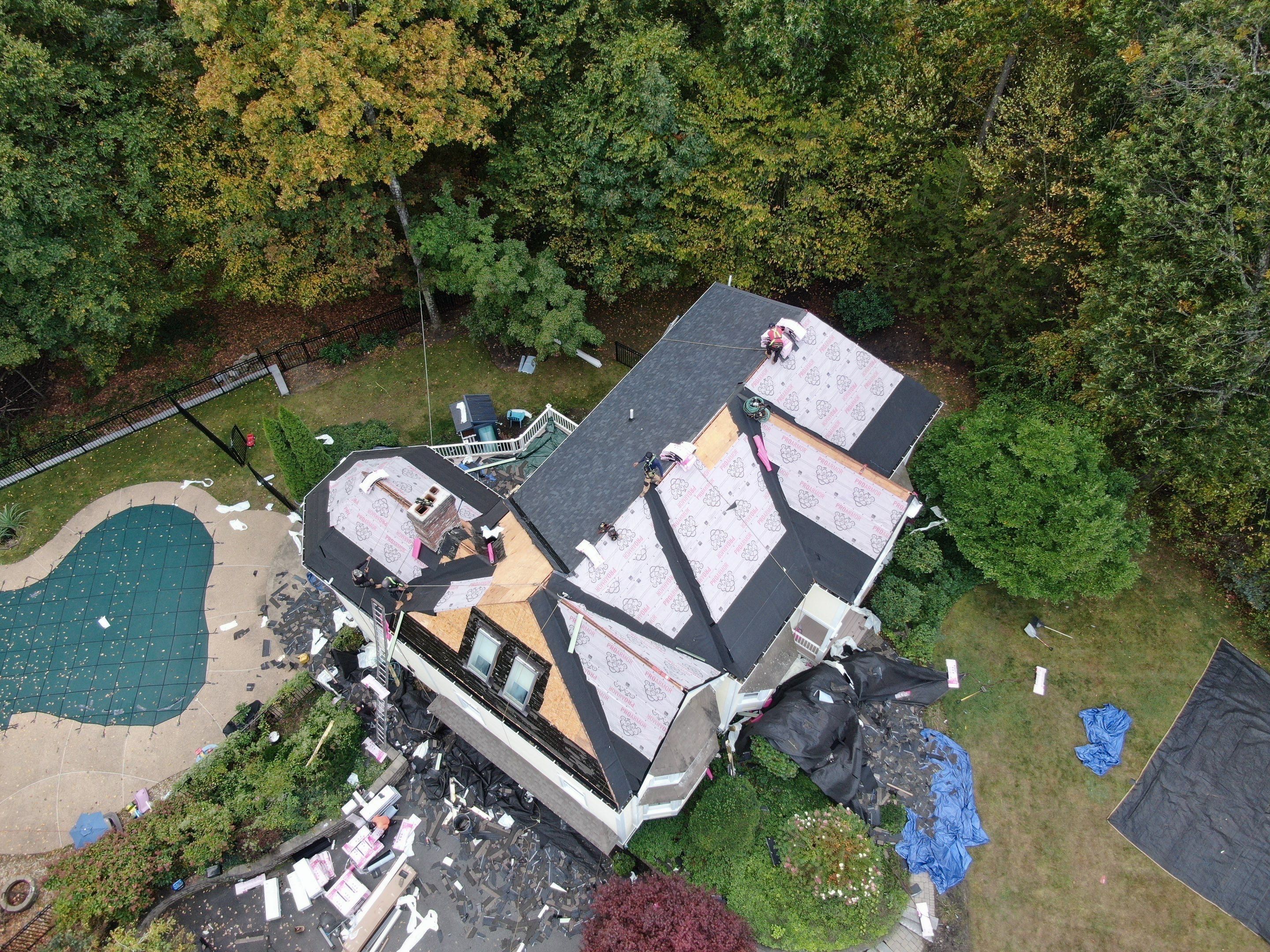 New Roof, Skylights, and Metal Accent Roof Installation in Groton by Mighty Dog Roofing of Greater Middlesex County
