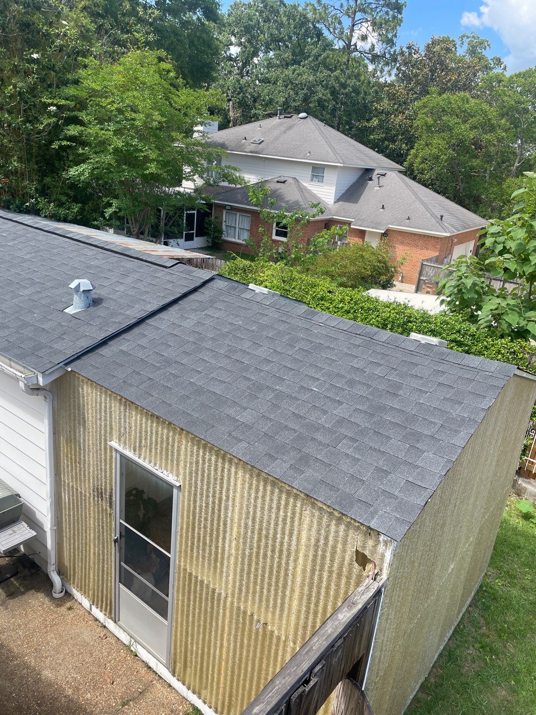 Residential Roofing Installation using Roof Replacement by American Roofing & Construction LLC