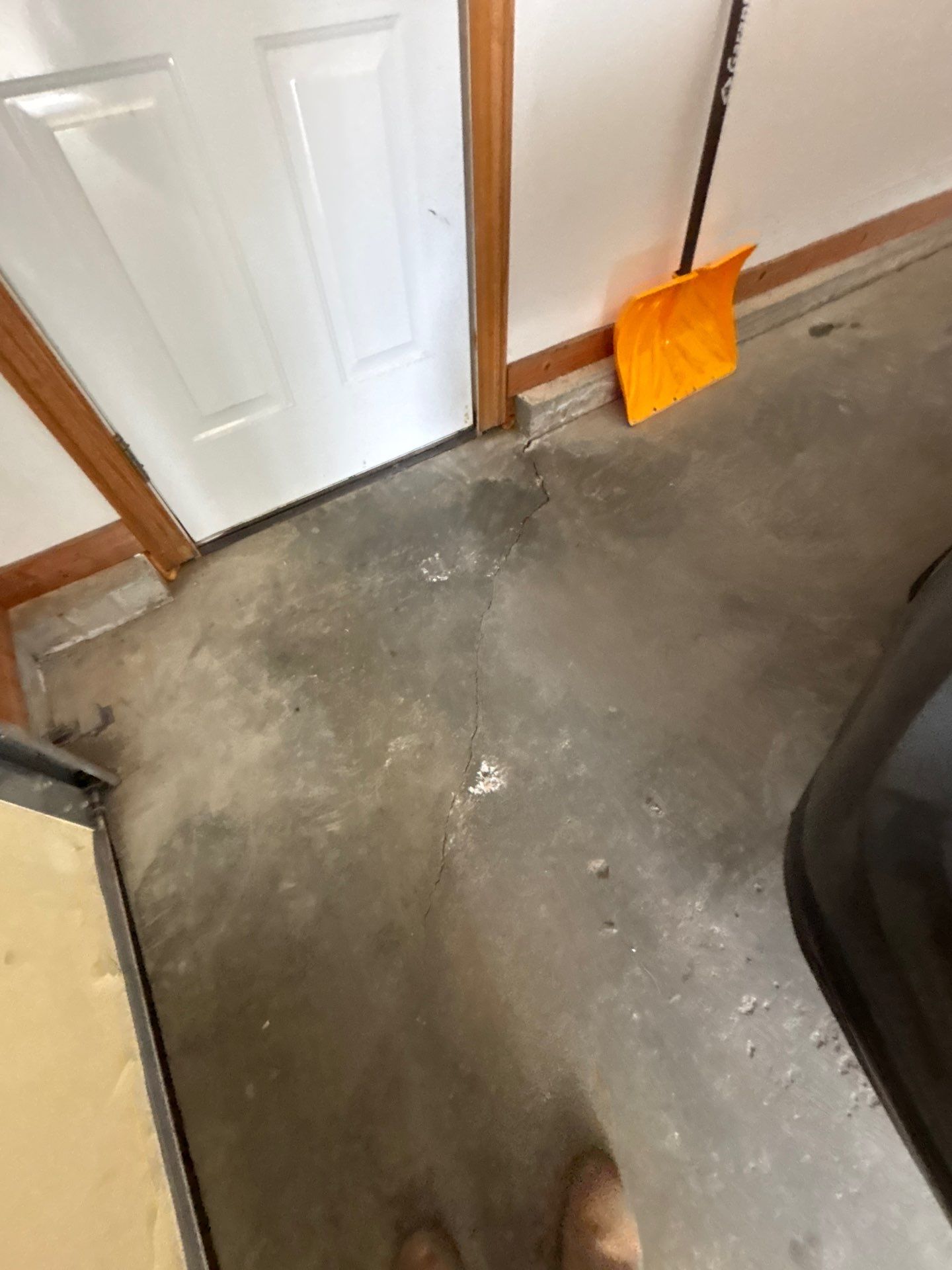 Gray and Black Speckled Polyurea Garage Floor in Dell Rapids by Select Painting, Coatings & Garage Cabinets