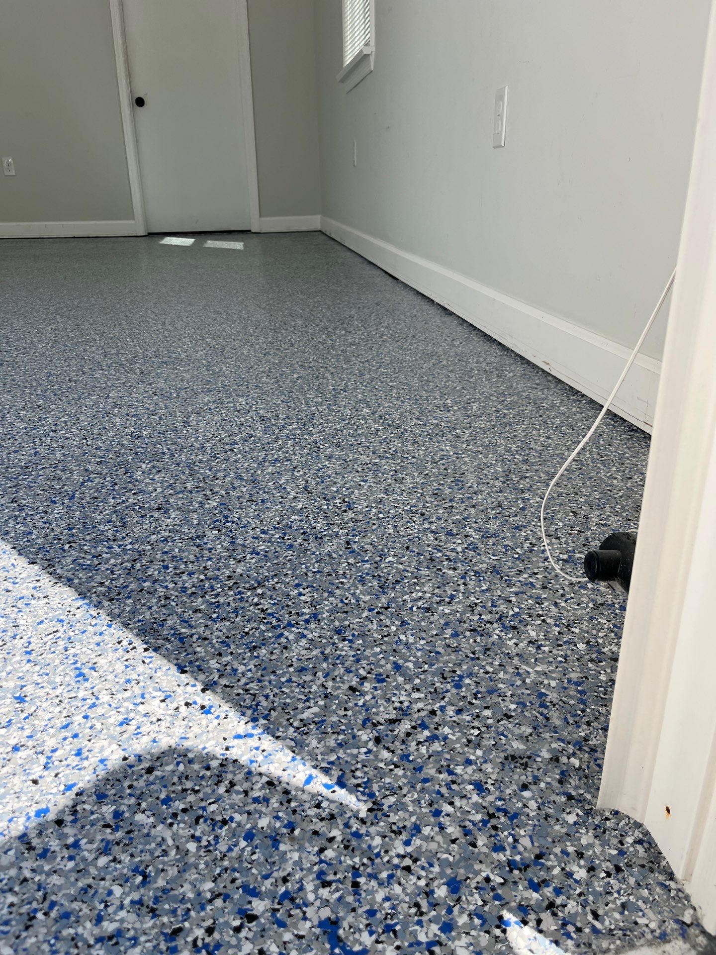 Garage Floor Coating using Comet by My Garage Floor Guys