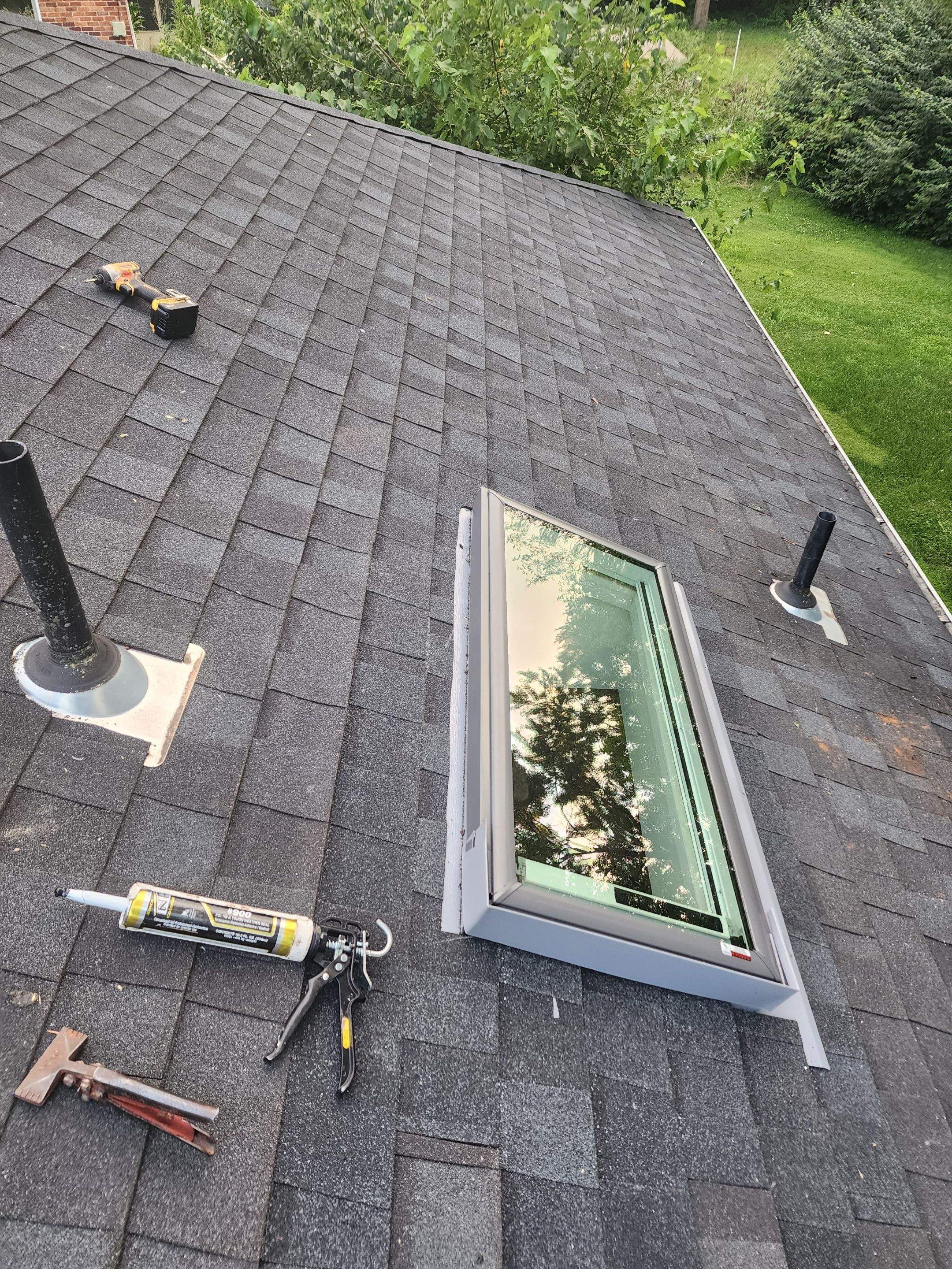 Dayton Skylight Replacement and Shingle Repair for Leaking Roof by Level Up Roofing and Restoration Services LLC