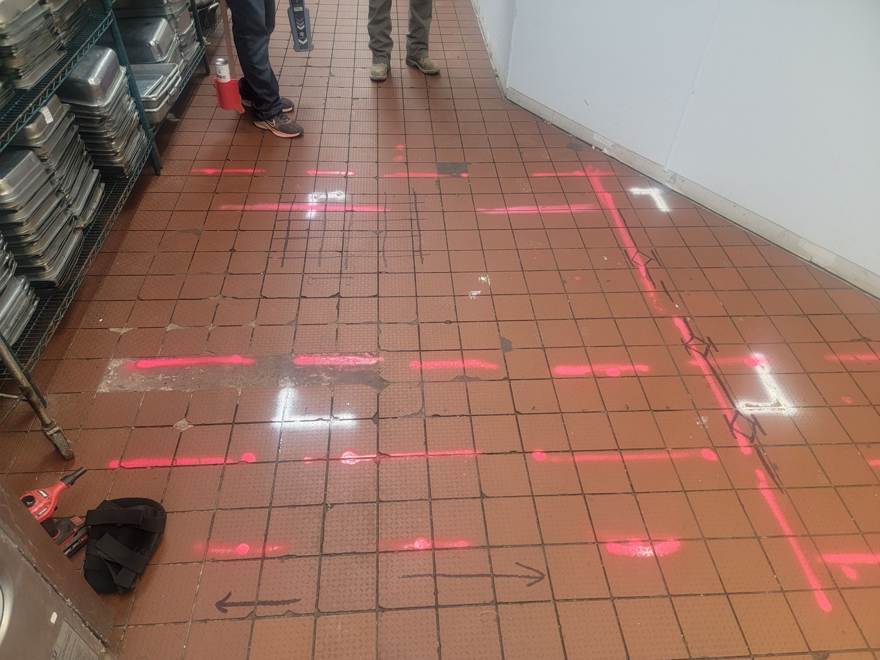 Marking Electrical Ducts within the concrete before saw cutting by Alsip Locating Service, LLC