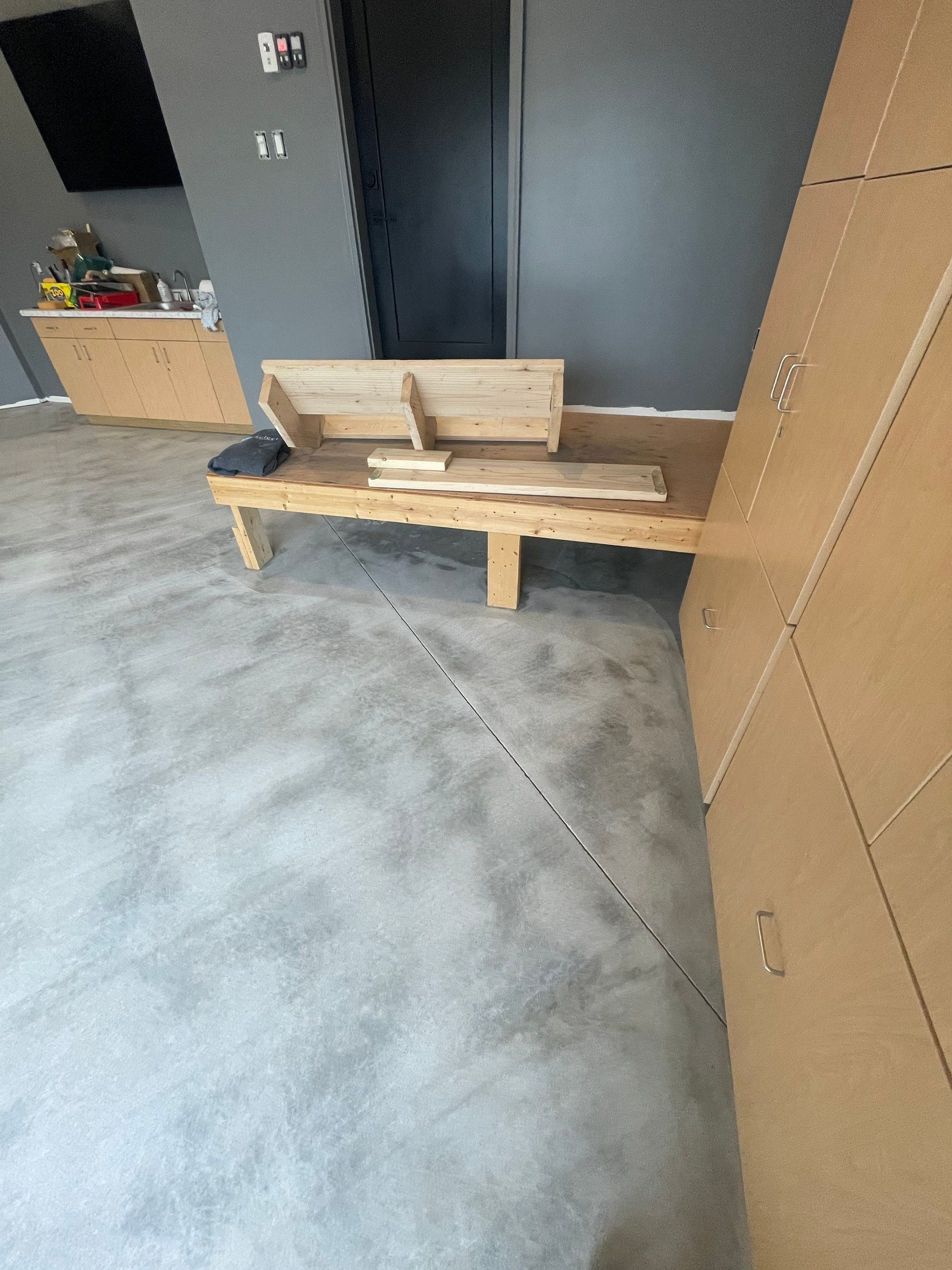 Custom Speckled Concrete Coating for Dell Rapids Garage by Select Painting, Coatings & Garage Cabinets