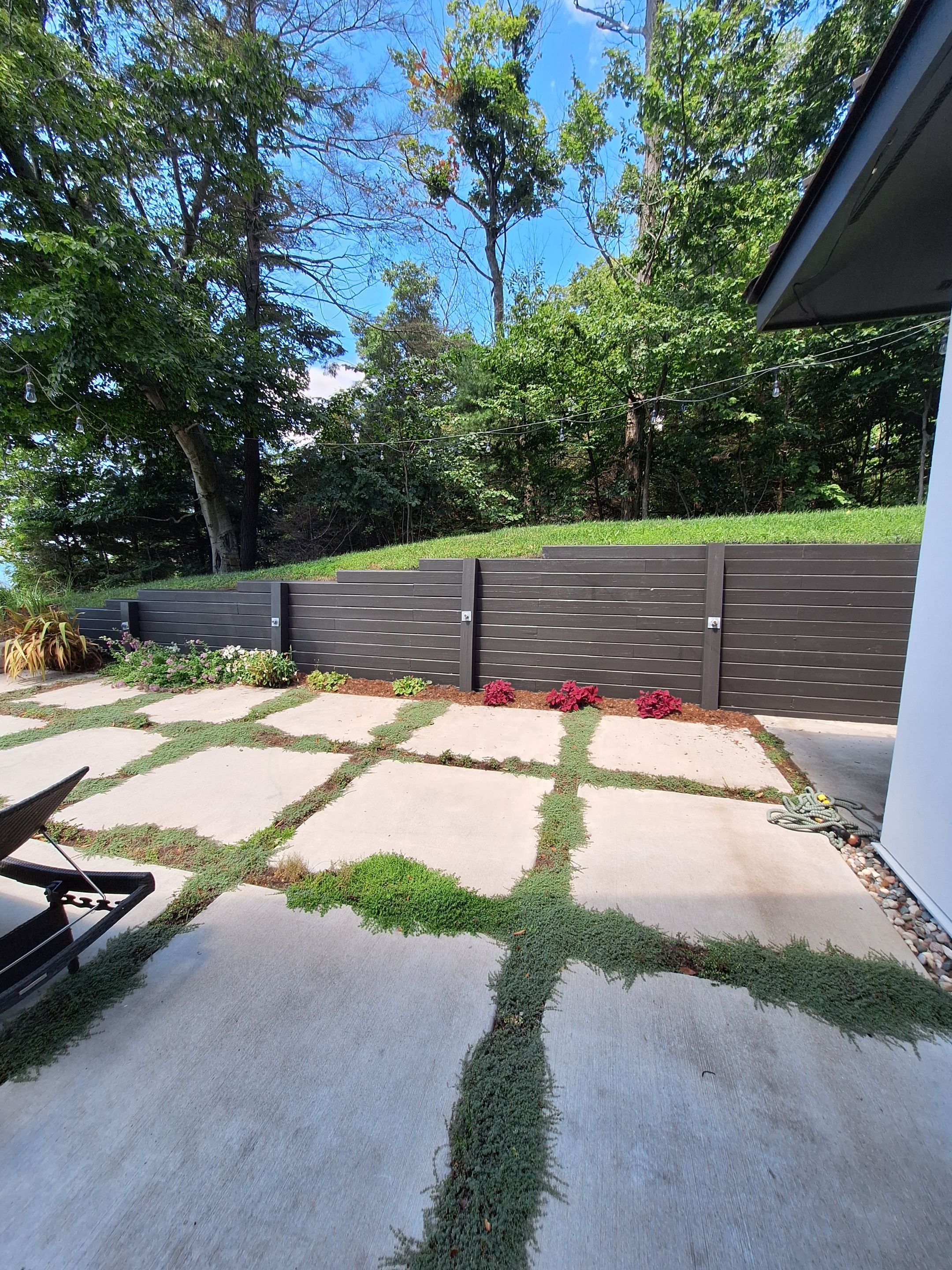 Exterior Retaining Wall Painting | Grand Haven, Michigan by Gordon Painting