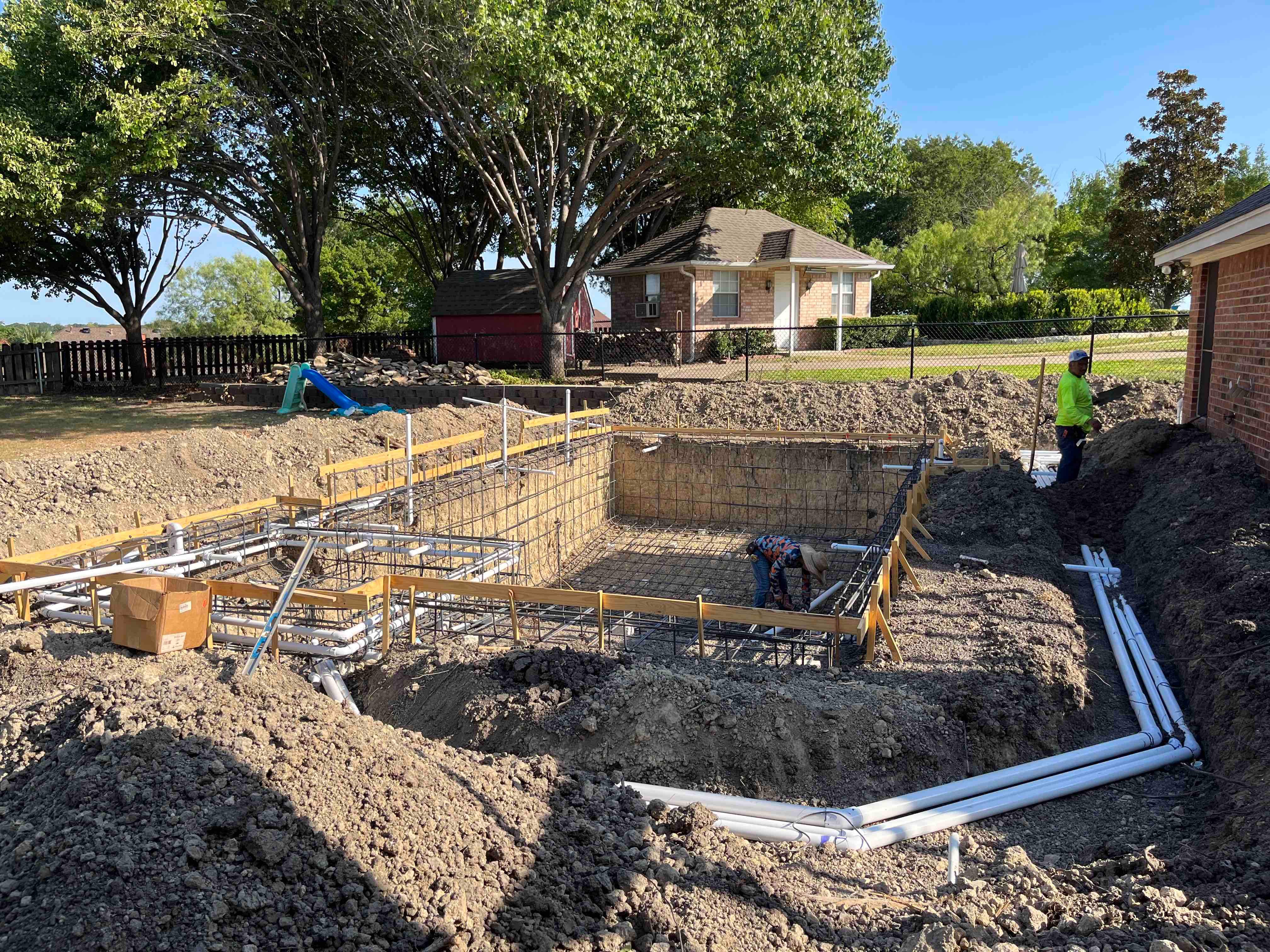 Geometric Pool with Raised Spa and Slide by Pinnacle Pools and Spas - DFW