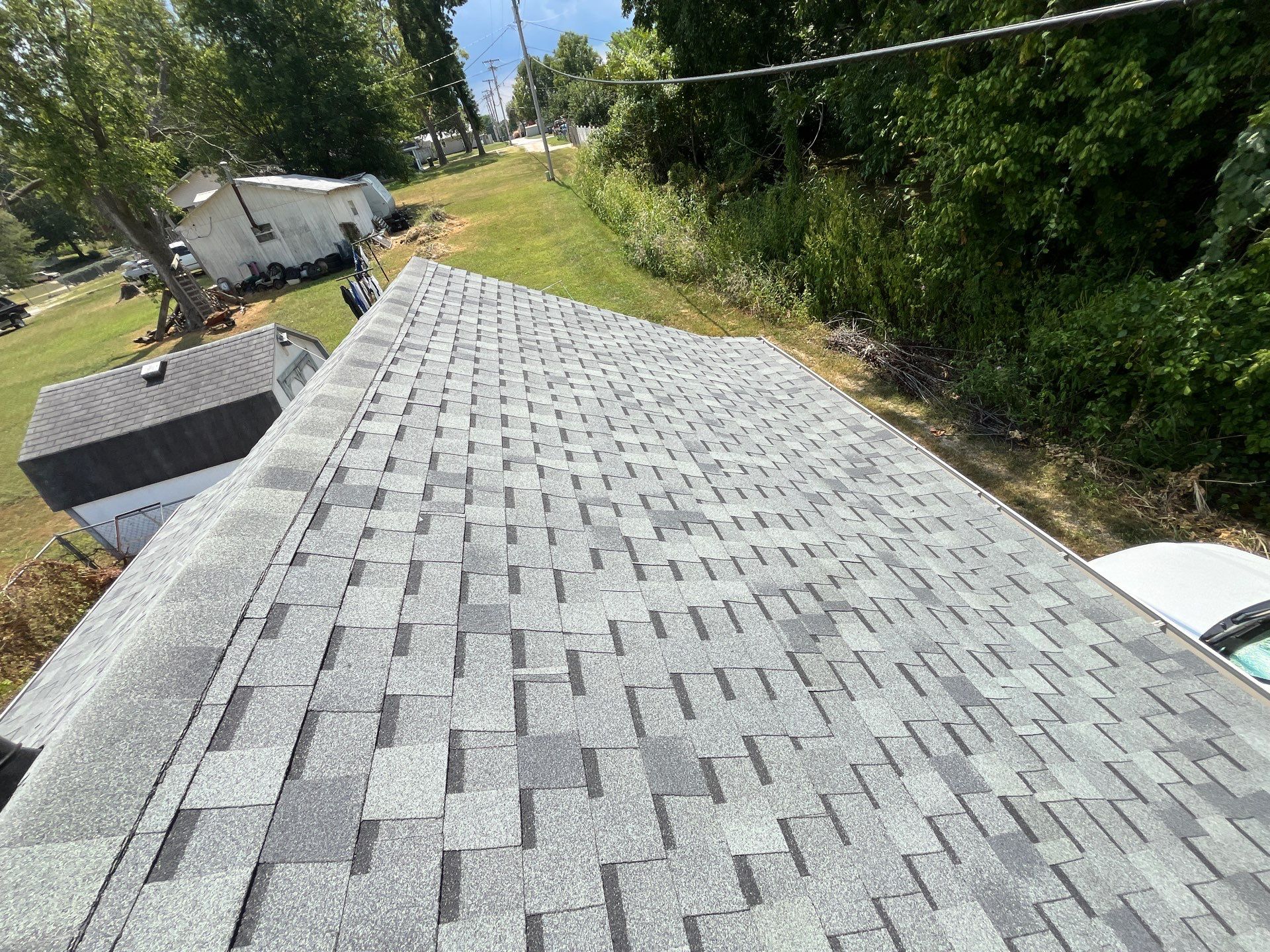 Residential Roofing Install - Atlas Pinnacle Pristine Shingles - Color Hearthstone  by Titan Commercial & Residential Roofing 