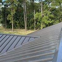24ga 1.5" Mechanical Seam Dark Bronze by Total Roofing System The Metal Roof Experts