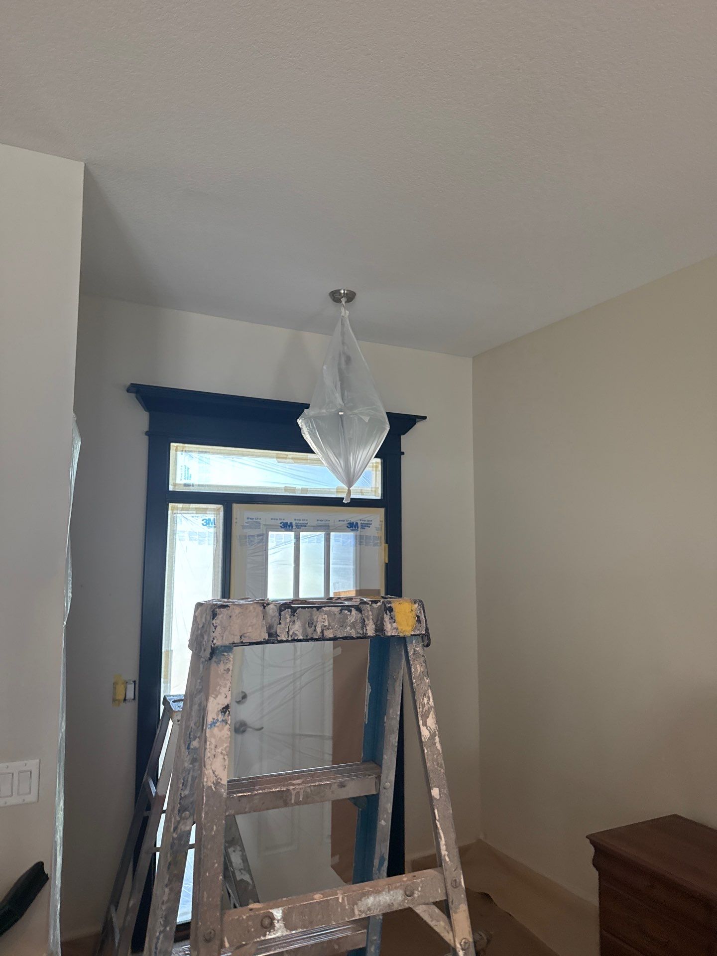 Residential Interior Repaint Color Change on Walls and Cabinets by Midwest Paint LLC