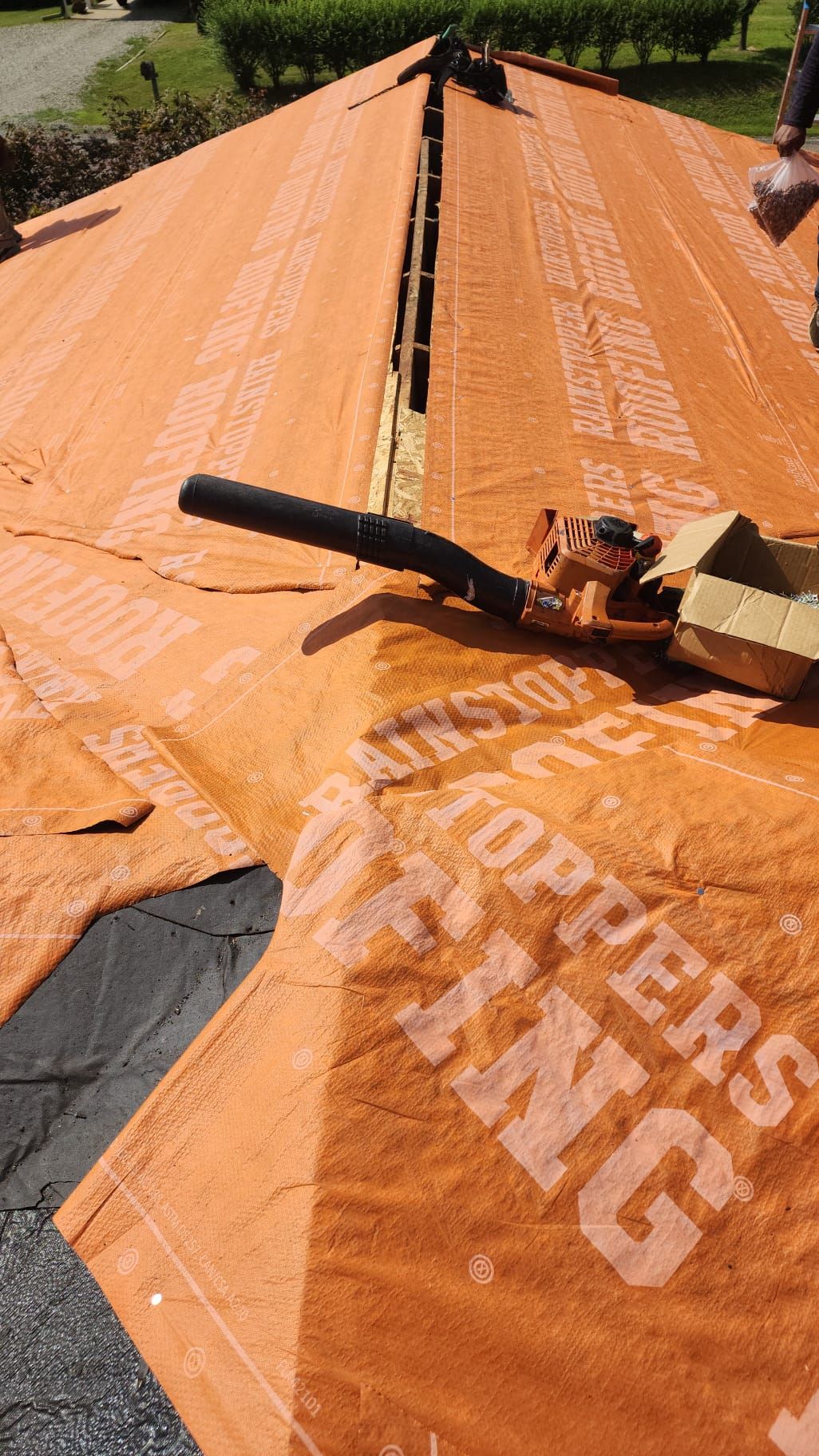 Residential Roofing Installation using Metal by Rainstoppers Roofing