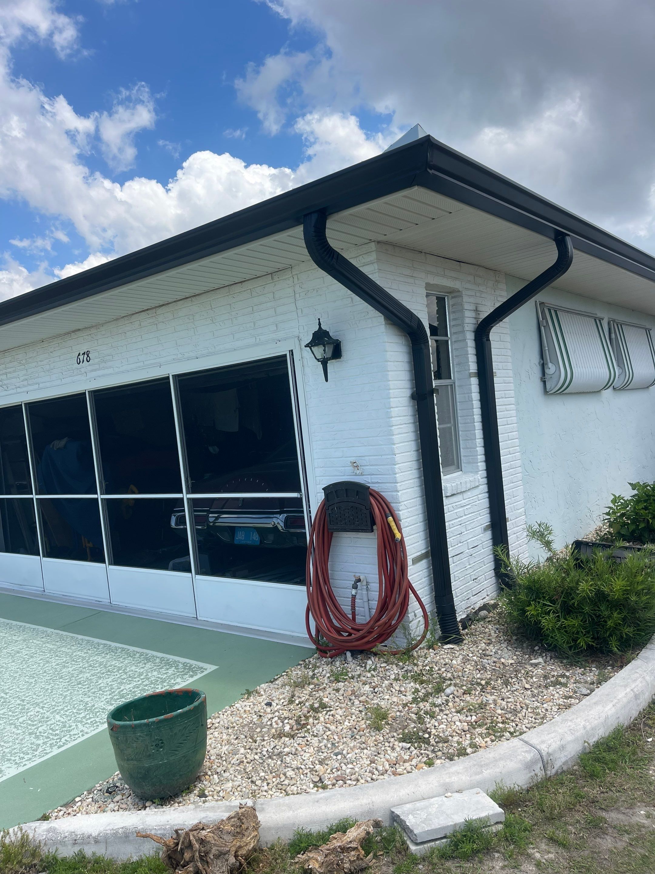 Black Aluminum Gutters Installation in Sun City Center FL by Gutter Professors