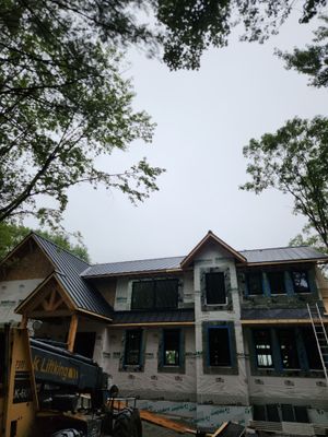 Custom Home Roofing – Matte Black Standing Seam