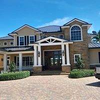 24ga 1.5" Mechanical Seam Dark Bronze by Total Roofing System The Metal Roof Experts