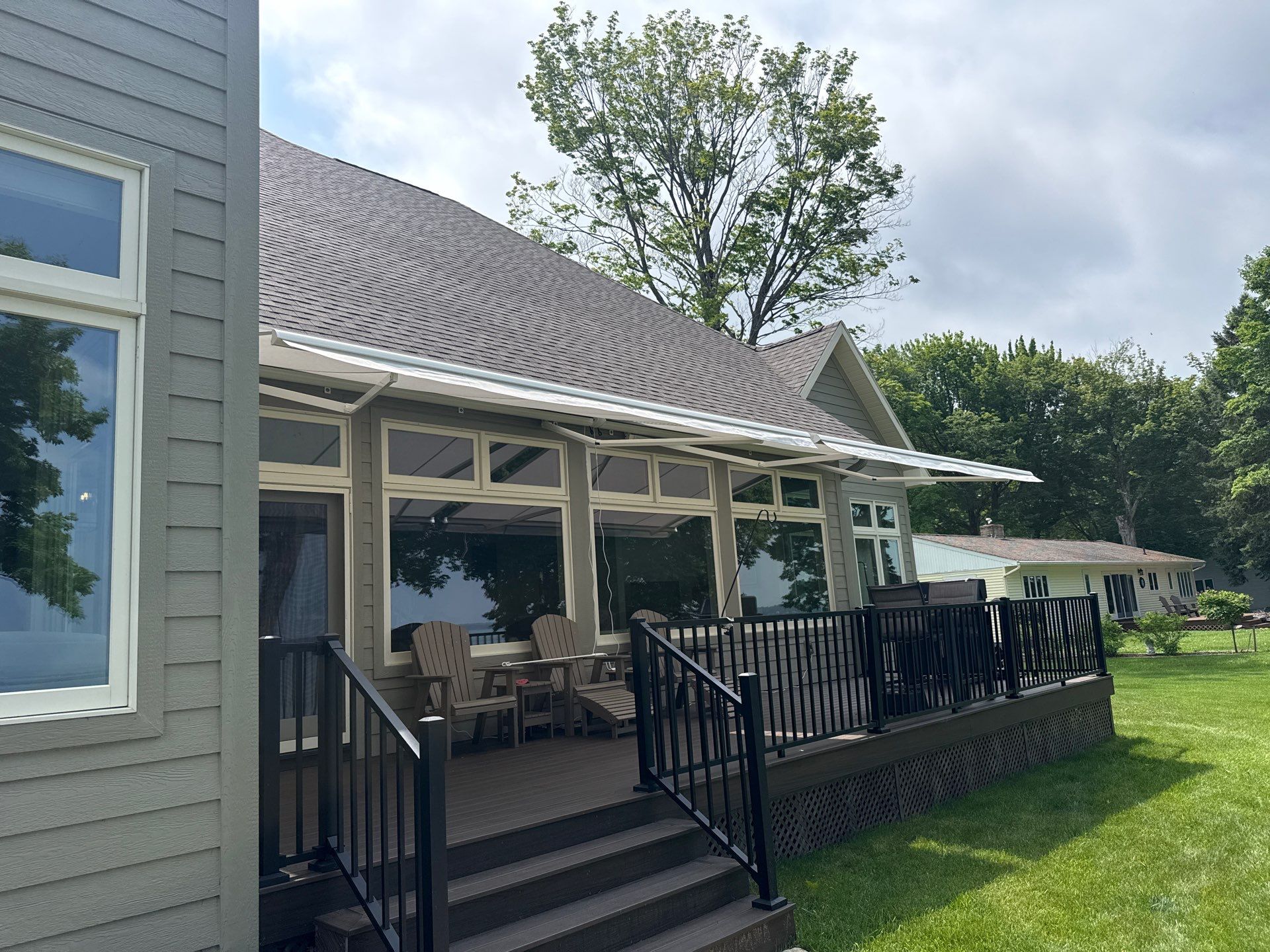 Sunesta Retractable Awning Installation for Sault Sainte Marie Lakeside Deck by Rainbow Seamless Systems