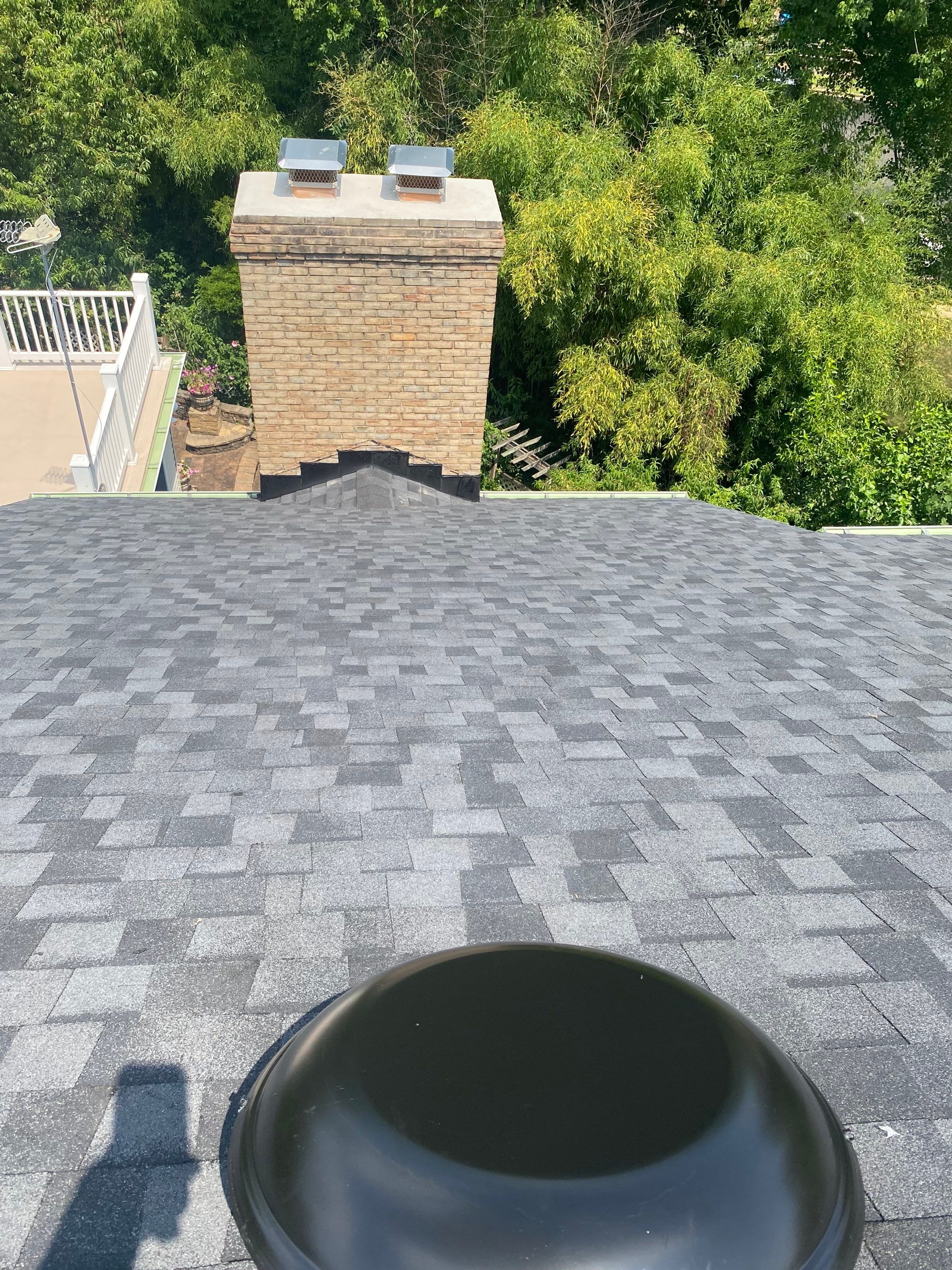 McLean: Residential Roof Installation with Landmark Pro Designer Shingles in Max Def Moire Black by RM Banning, Inc.