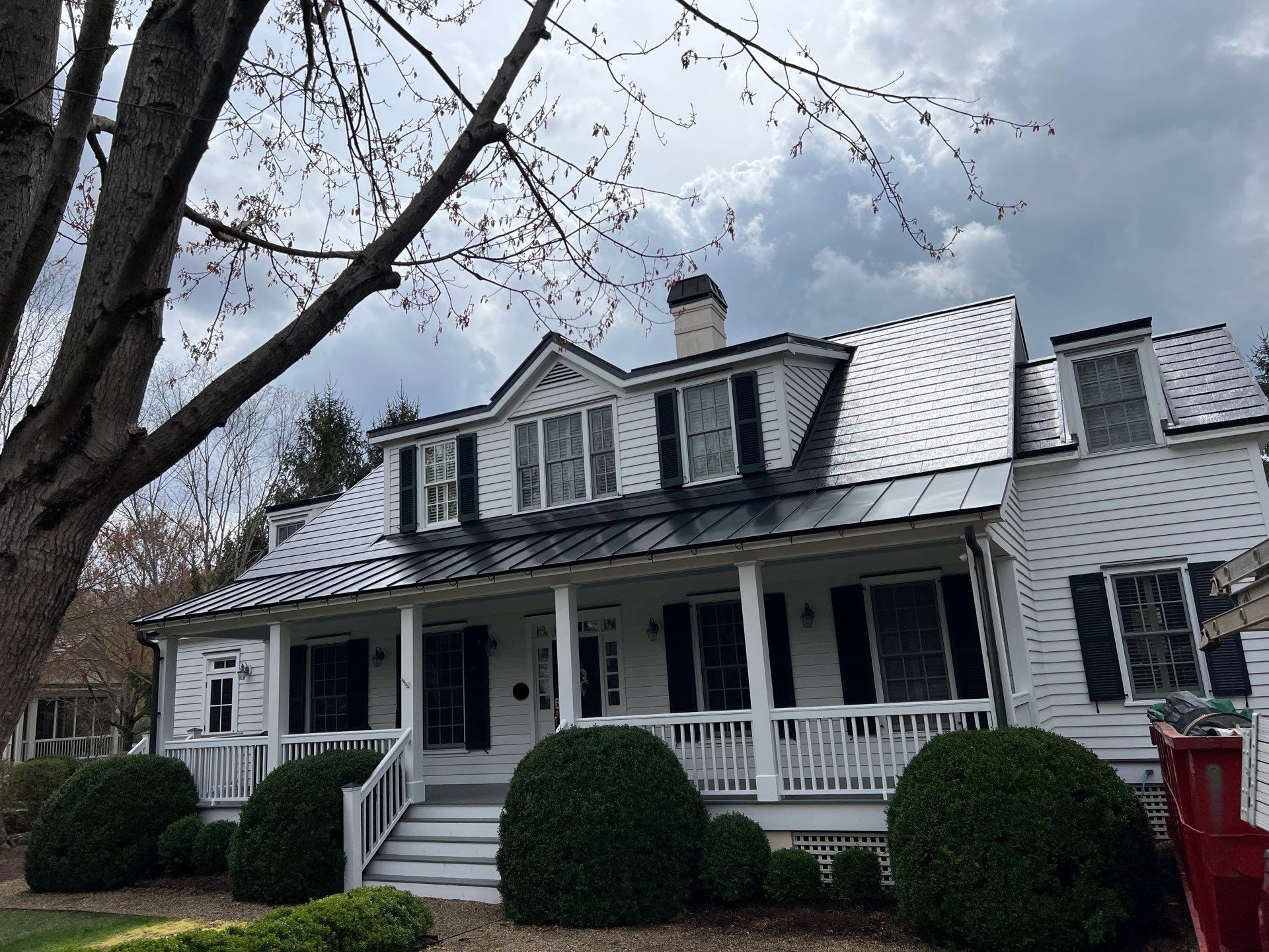 Tesla Solar Roof using Tesla Solar Roof by American Home Contractors