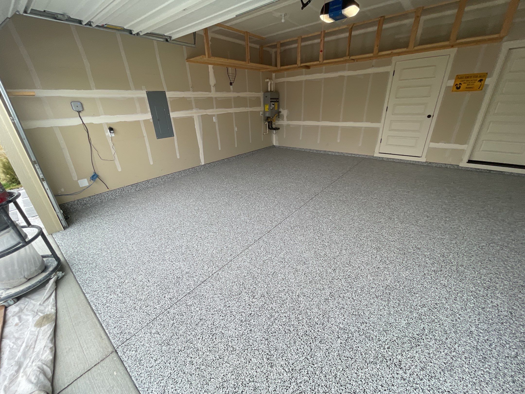 Garage Transformation using Domino by Croc Coatings, LLC