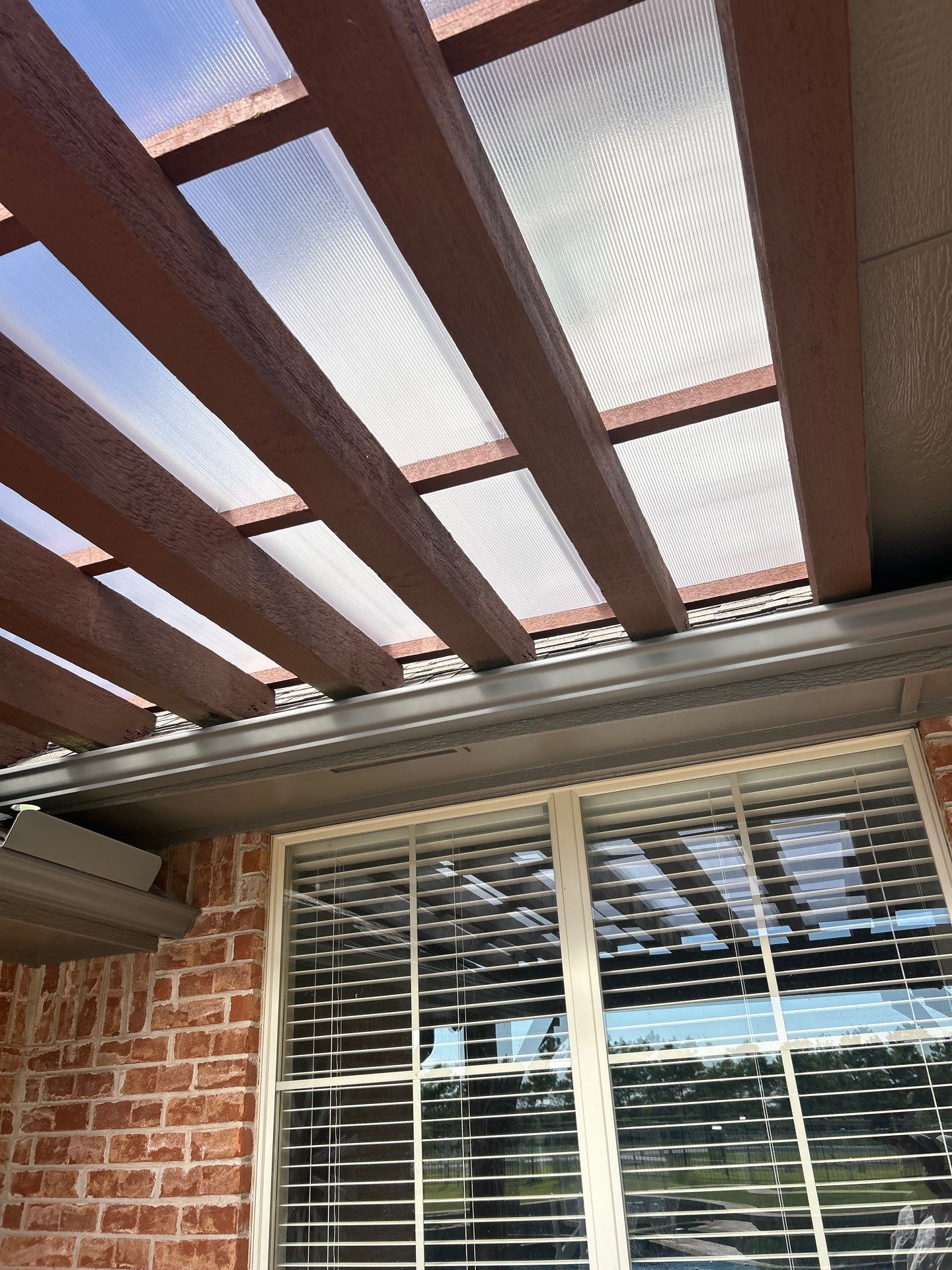 Siding Replacement and Exterior Painting and Pergola Cover Install in Edmond, OK by McCann's Roofing and Construction