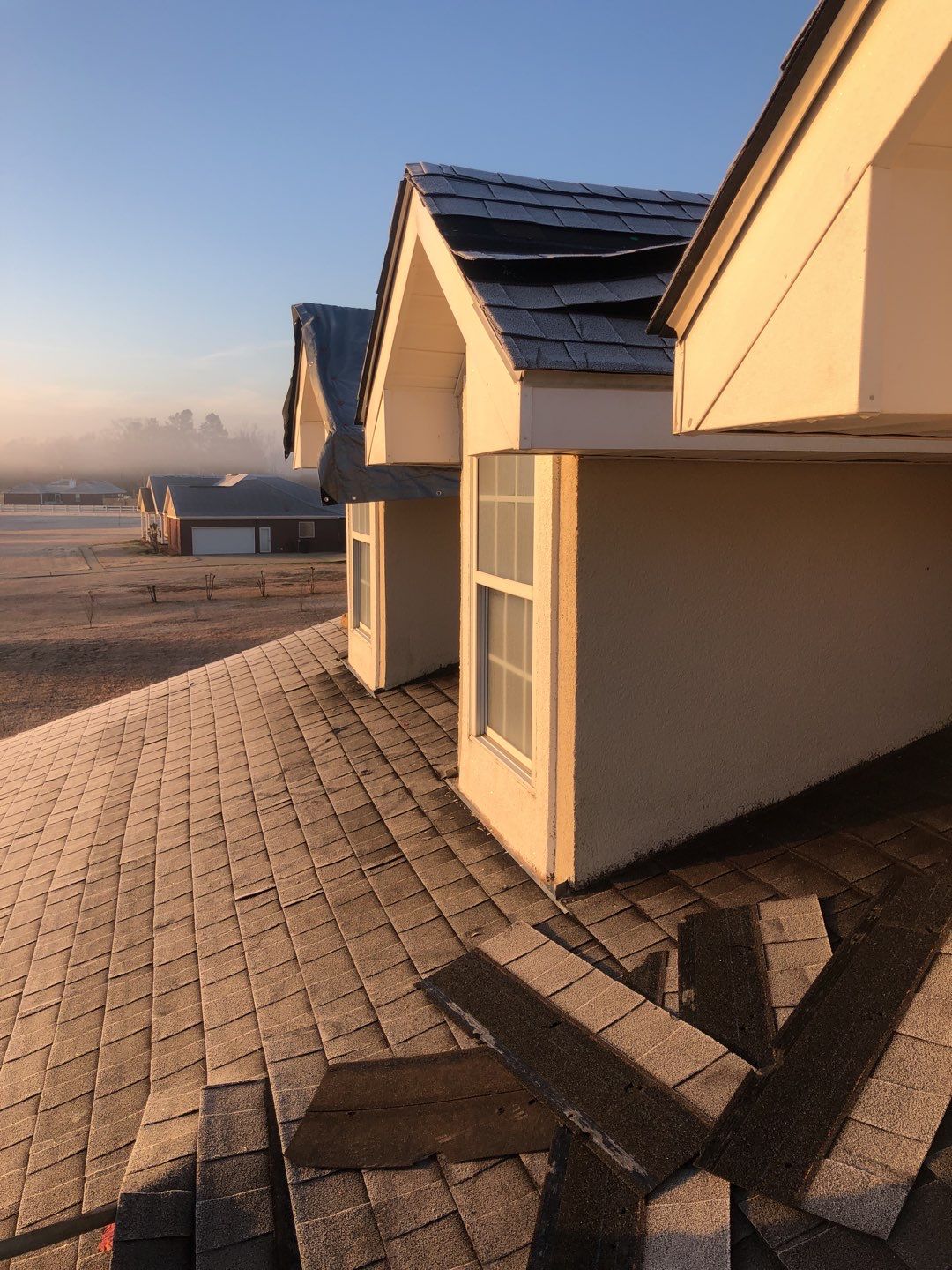 Residential Roofing Installation using Roof Replacement by American Roofing & Construction LLC