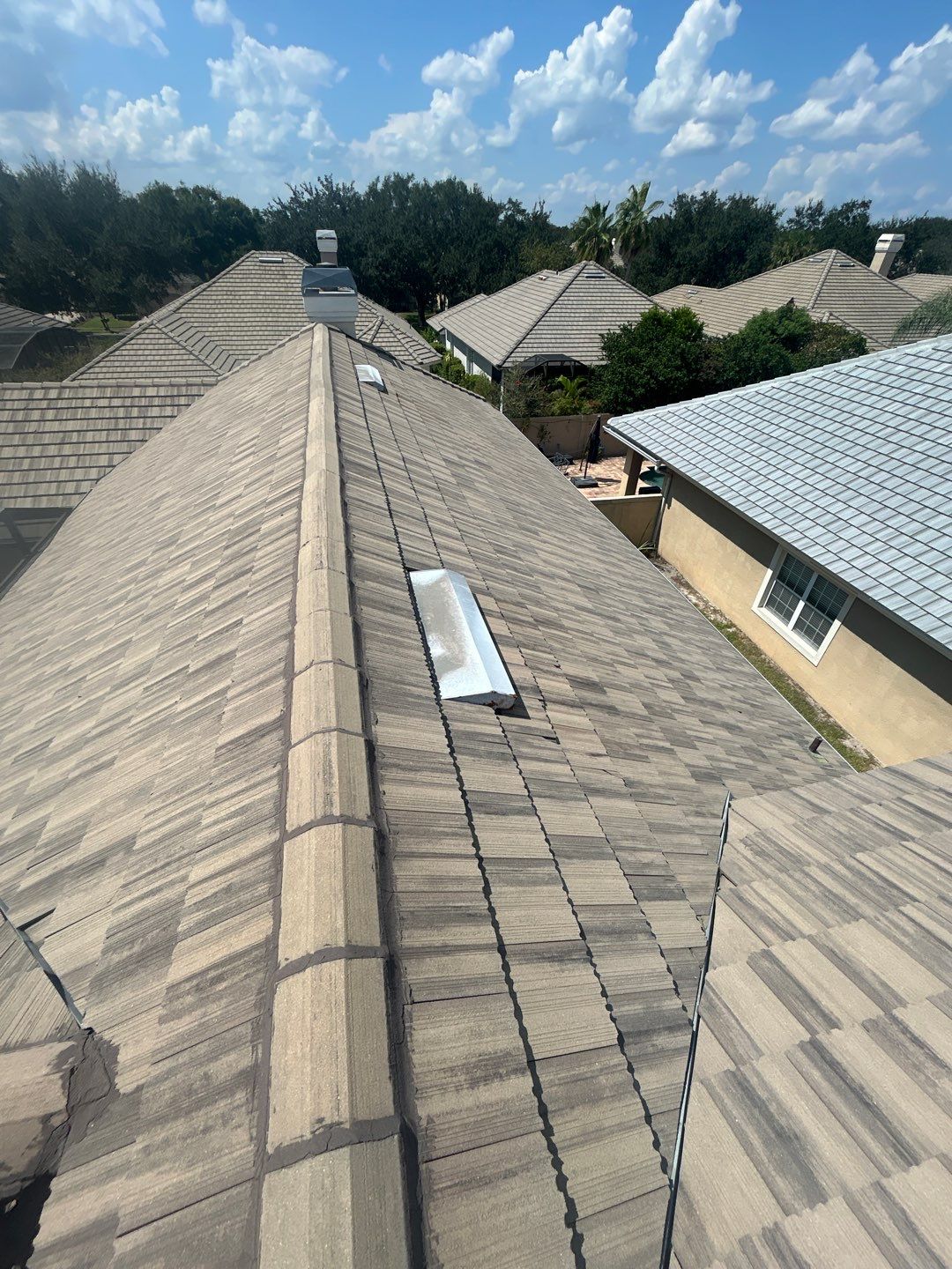 Concrete Tile Roof Repair and Gutter Maintenance in Orlando by Fortified Roofing Solutions Corp.