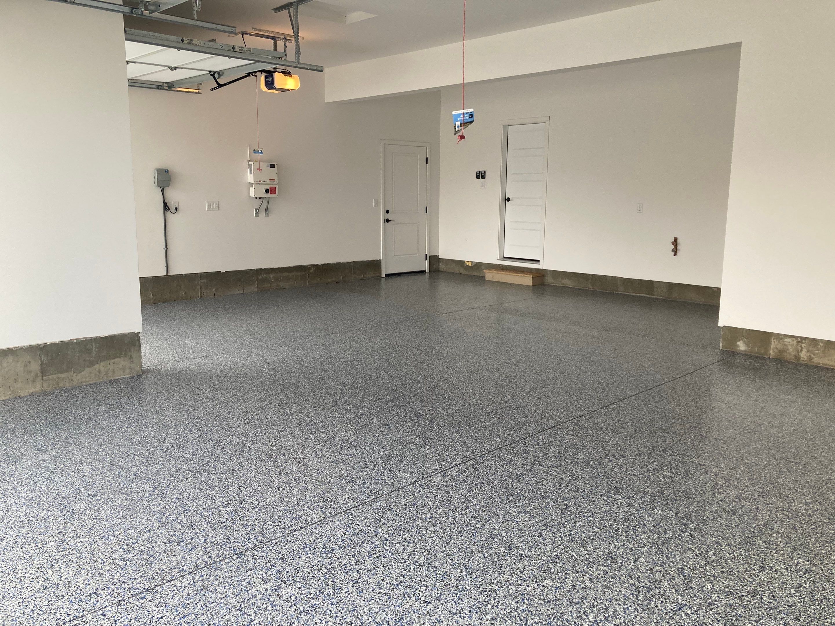 Garage Transformation using Domino with Blue by Croc Coatings, LLC