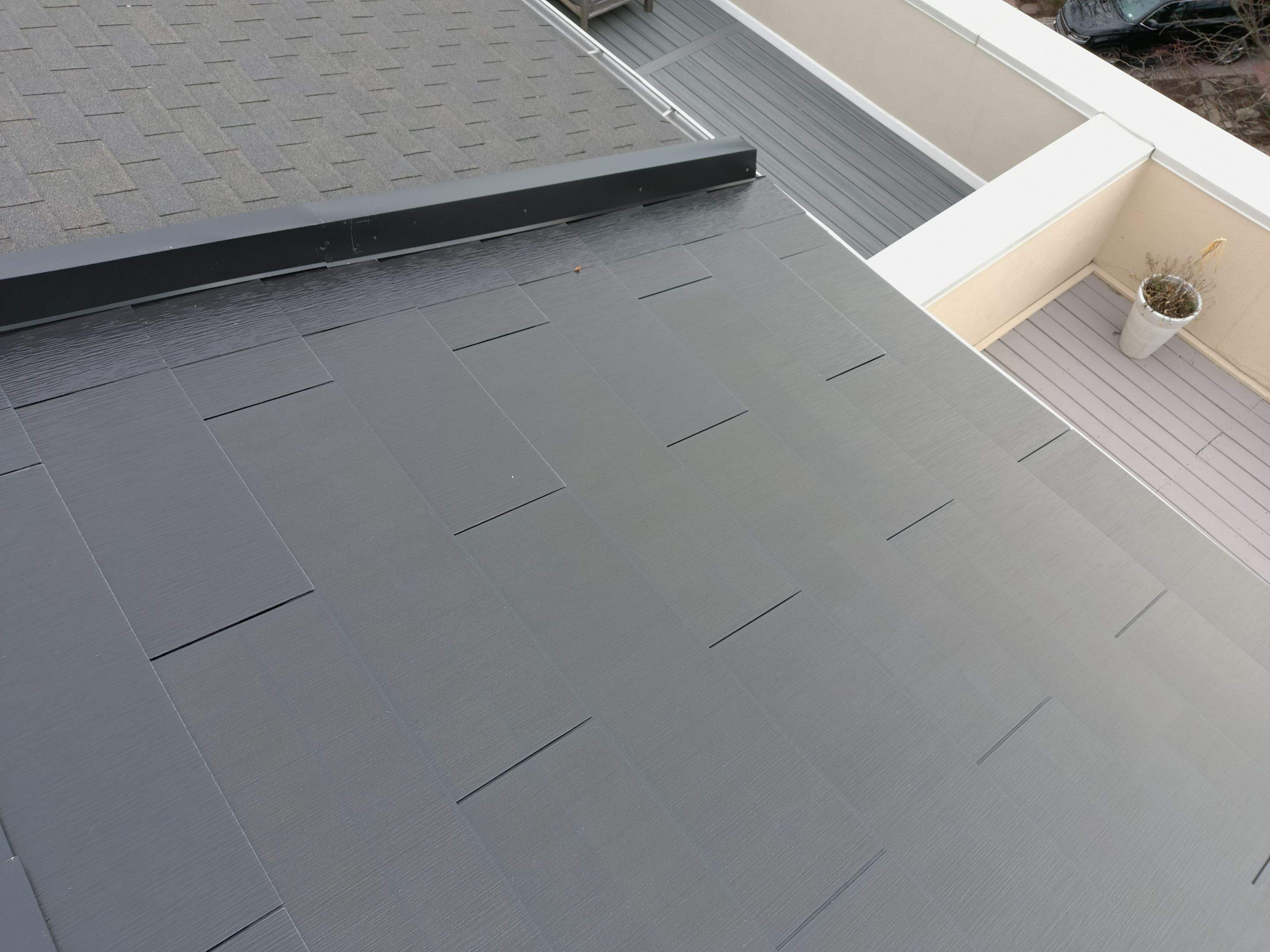 Tesla Solar Roof on a Townhouse in Reston, VA by American Home Contractors