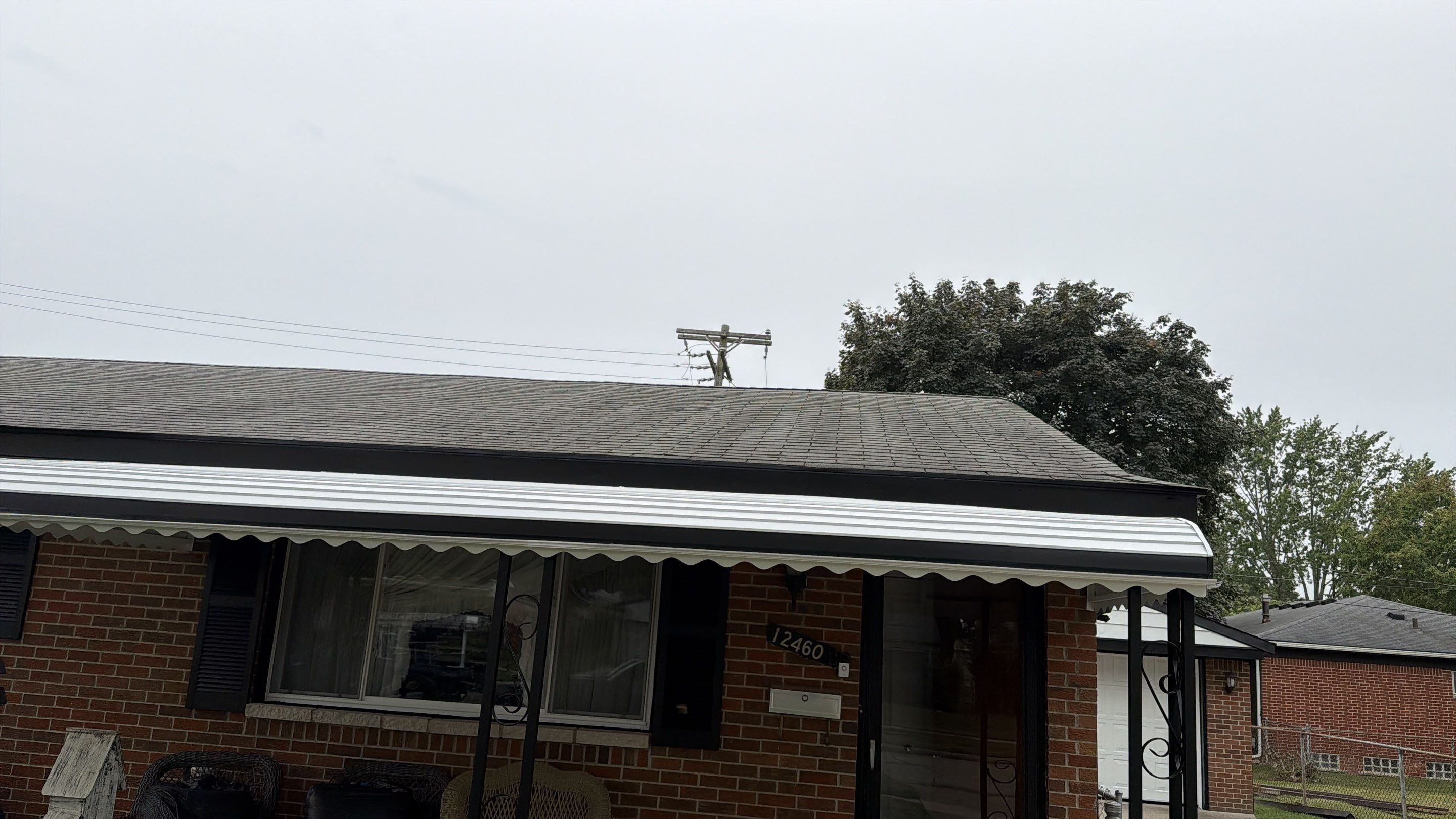 White Vinyl Siding and Gutter Installation in Sterling Heights by Top Shelf Painter