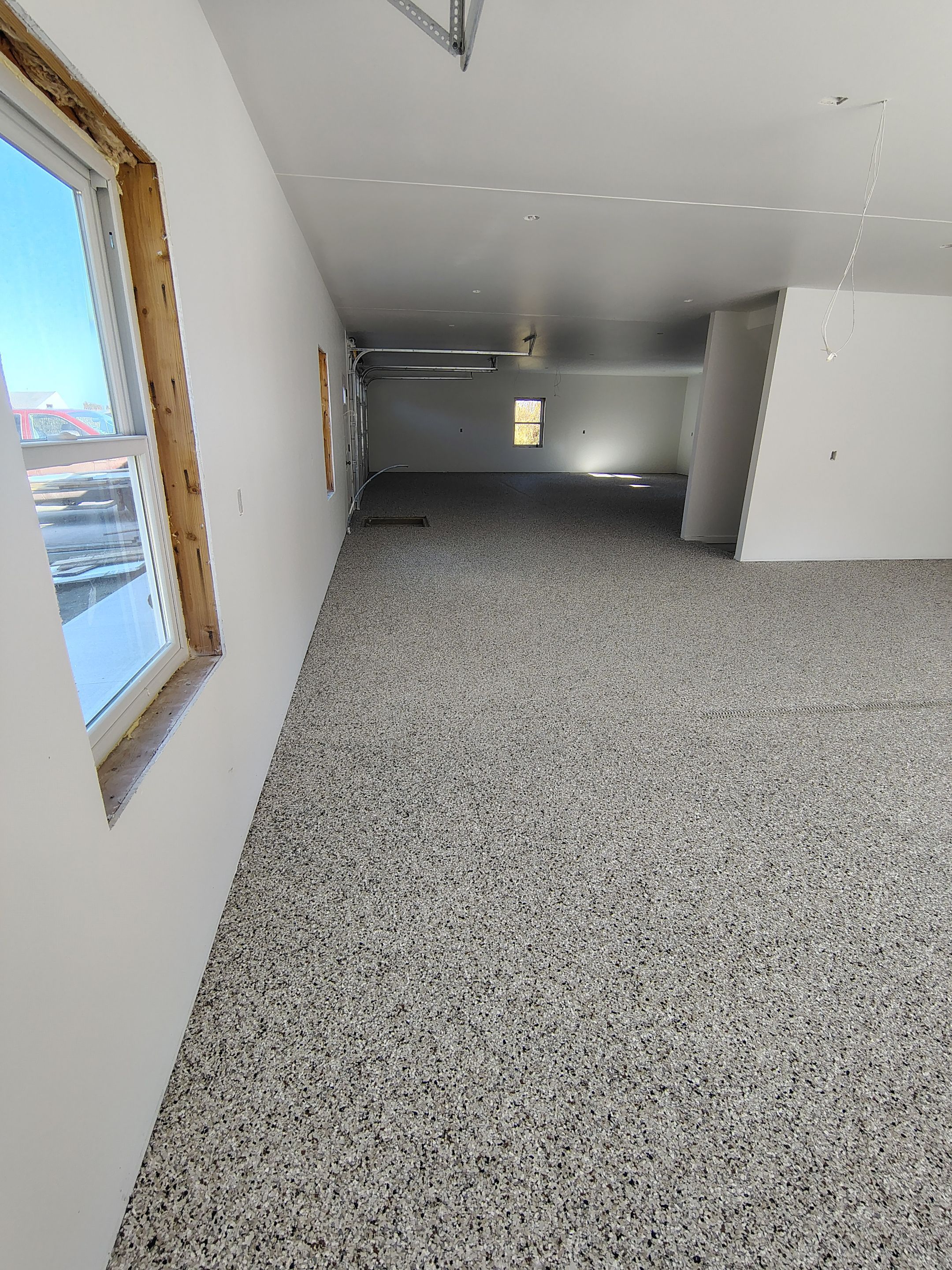 Custom Garage and Basement Epoxy Floor Coating in Menno by Select Painting, Coatings & Garage Cabinets
