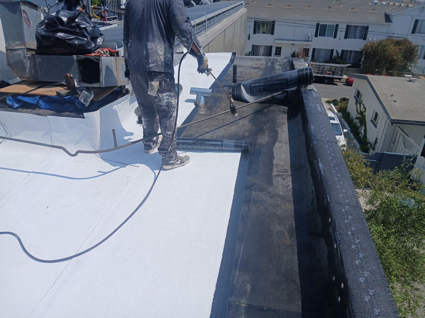 Residential Roofing Installation using Polyglass Torch Down Roofing System by Hull Brothers Roofing