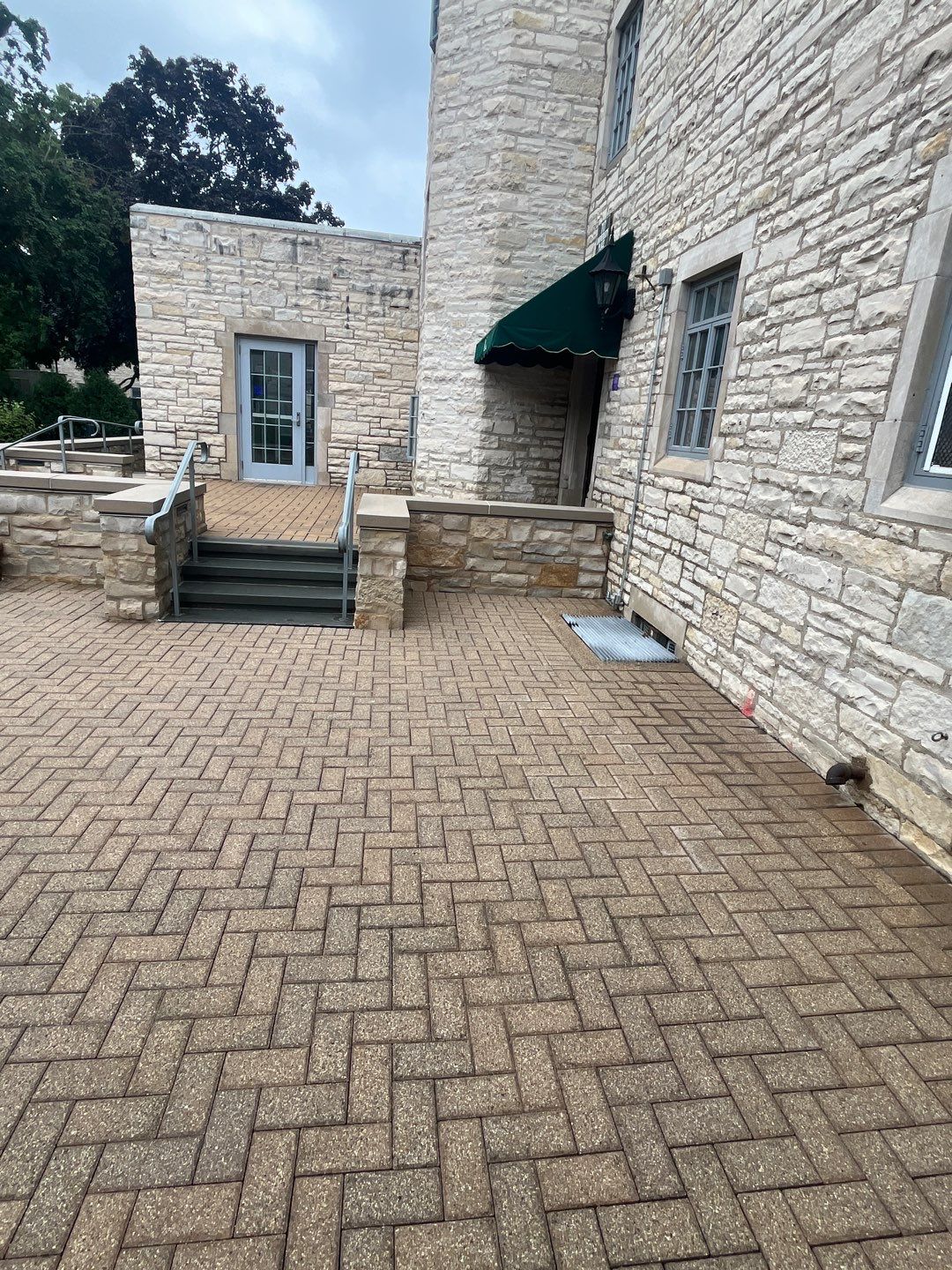 Brick paver cleaning. by Northern Power Washing LLC.