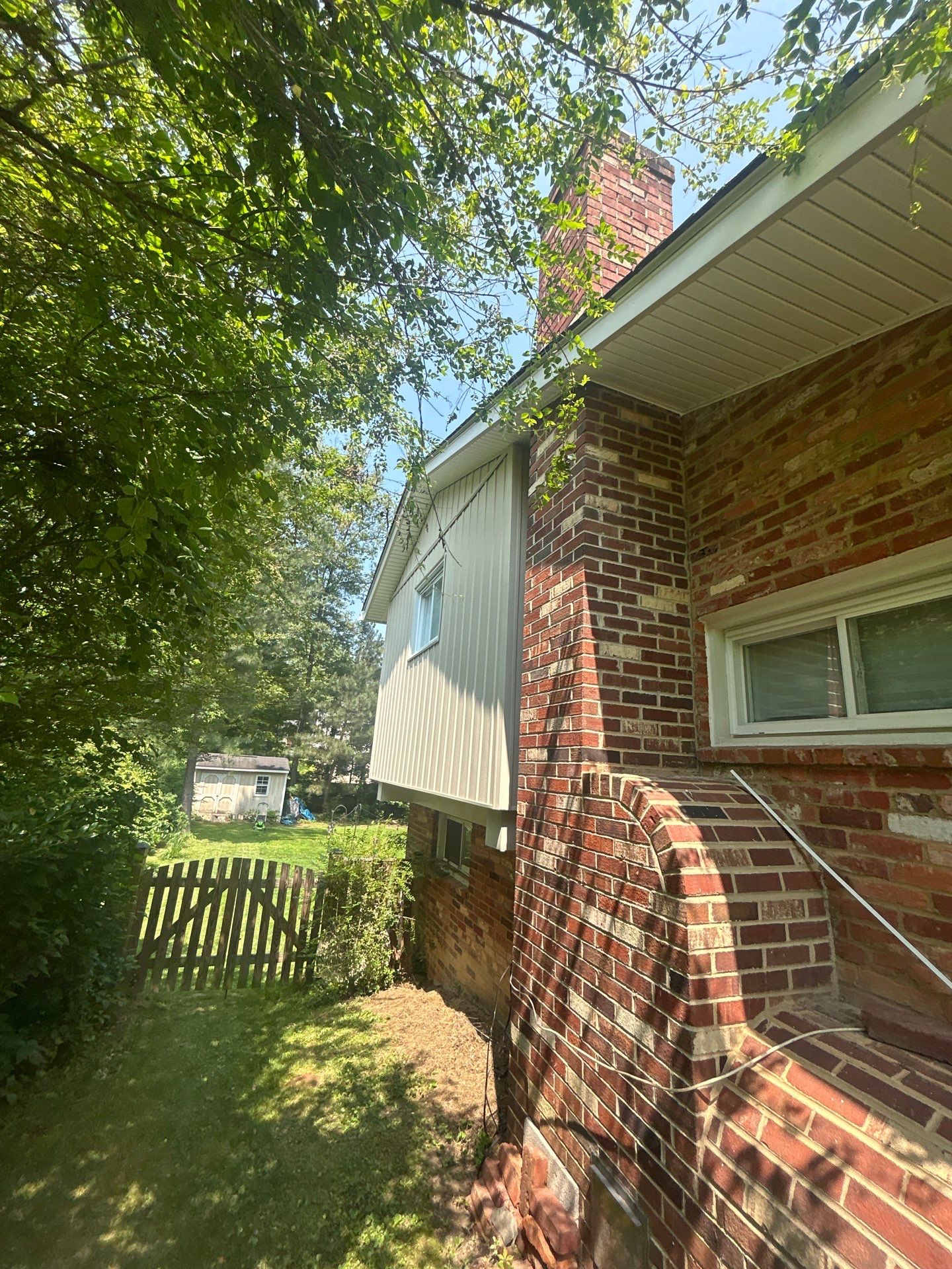 Fairfax: Residential Siding Replacement with CertainTeed 8" Board and Batten Siding in Desert Tan by RM Banning, Inc.