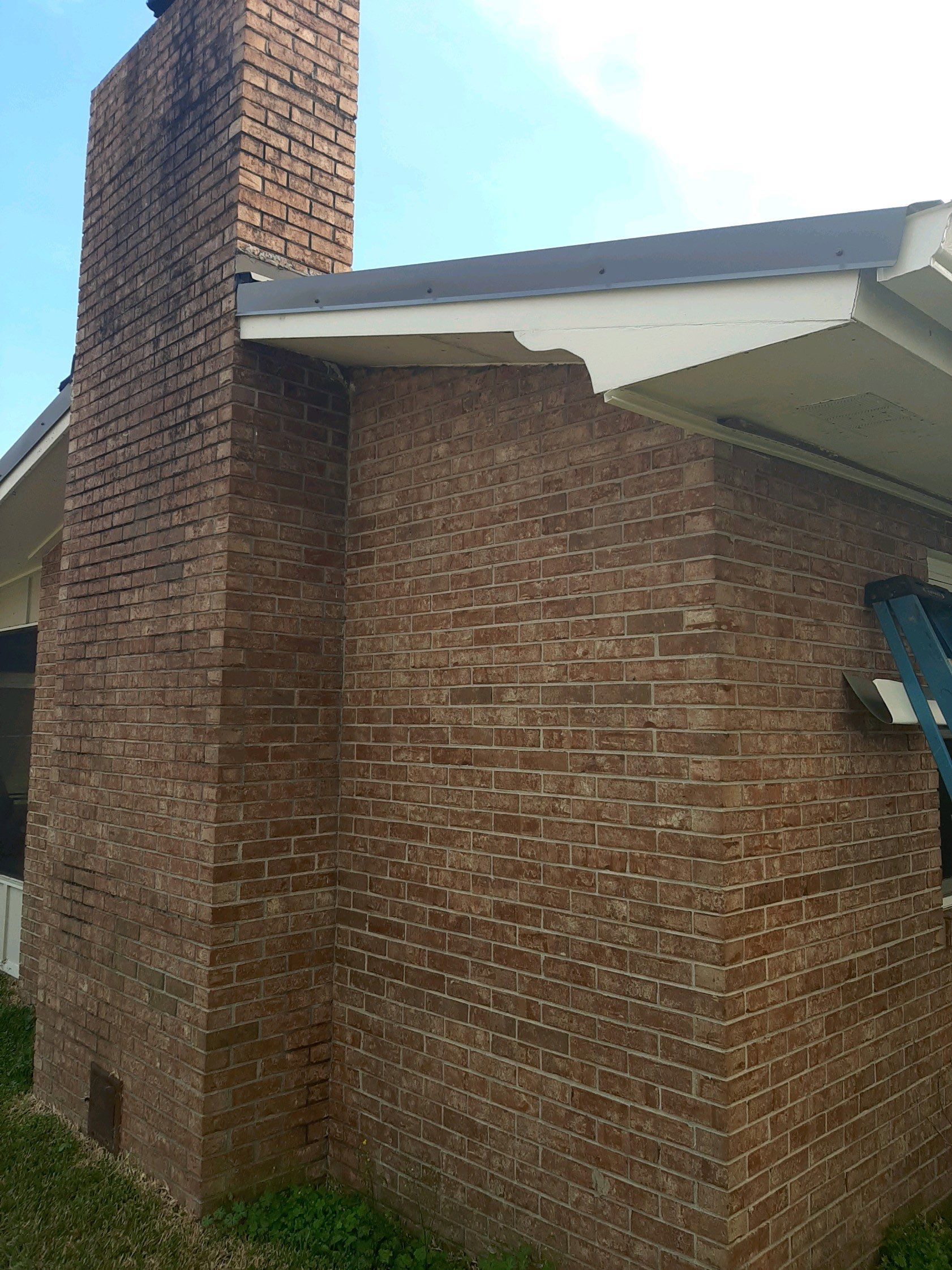 Soffit and Fascia Installation Using White Vinyl Soffit by Gutter Professors
